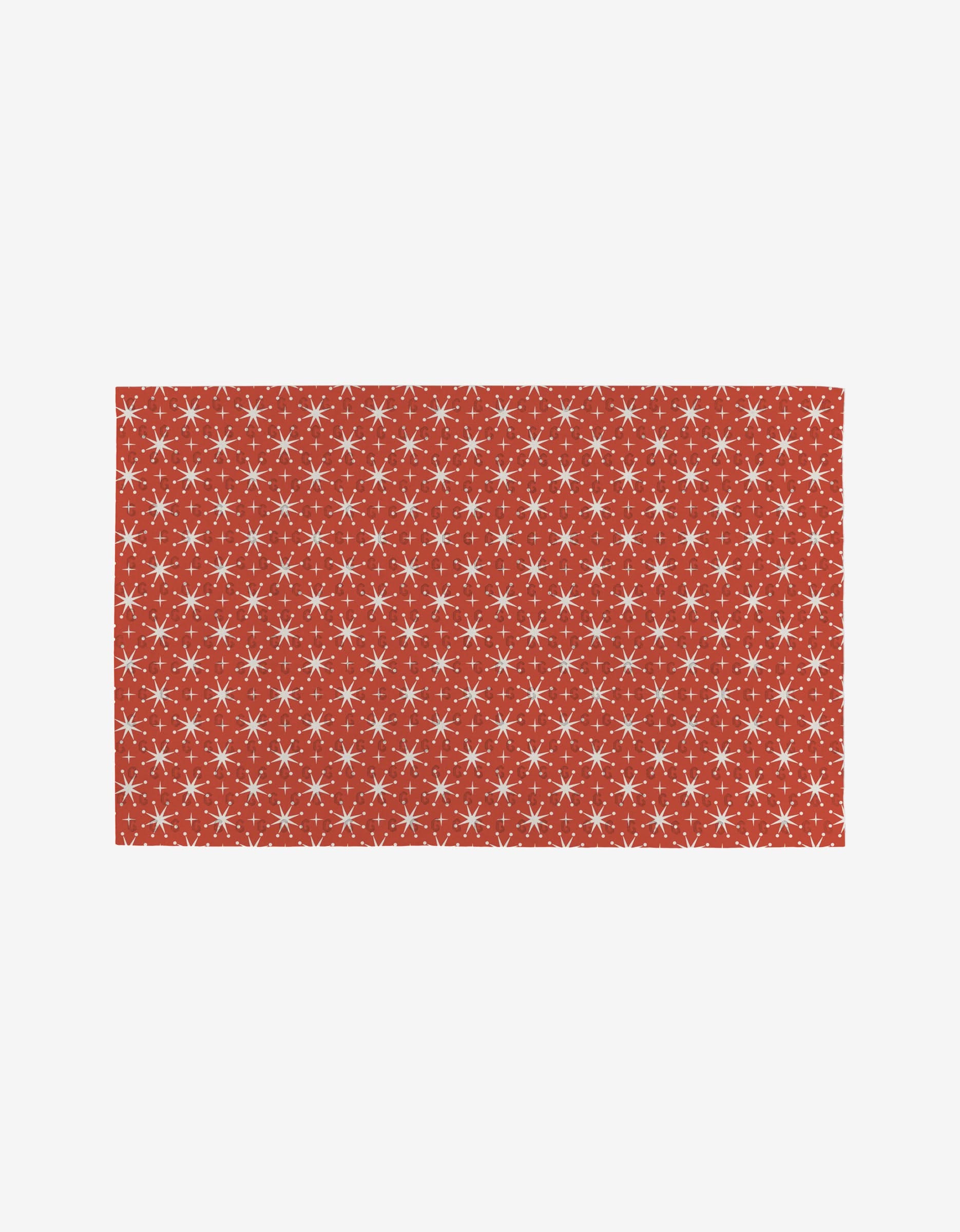 The Merry Berry by Charlie Rowan Designs is a rectangular red cloth with a grid of small white stars, shown on a plain white background. This eco-friendly reusable cleaner is a sustainable alternative to paper towels.
