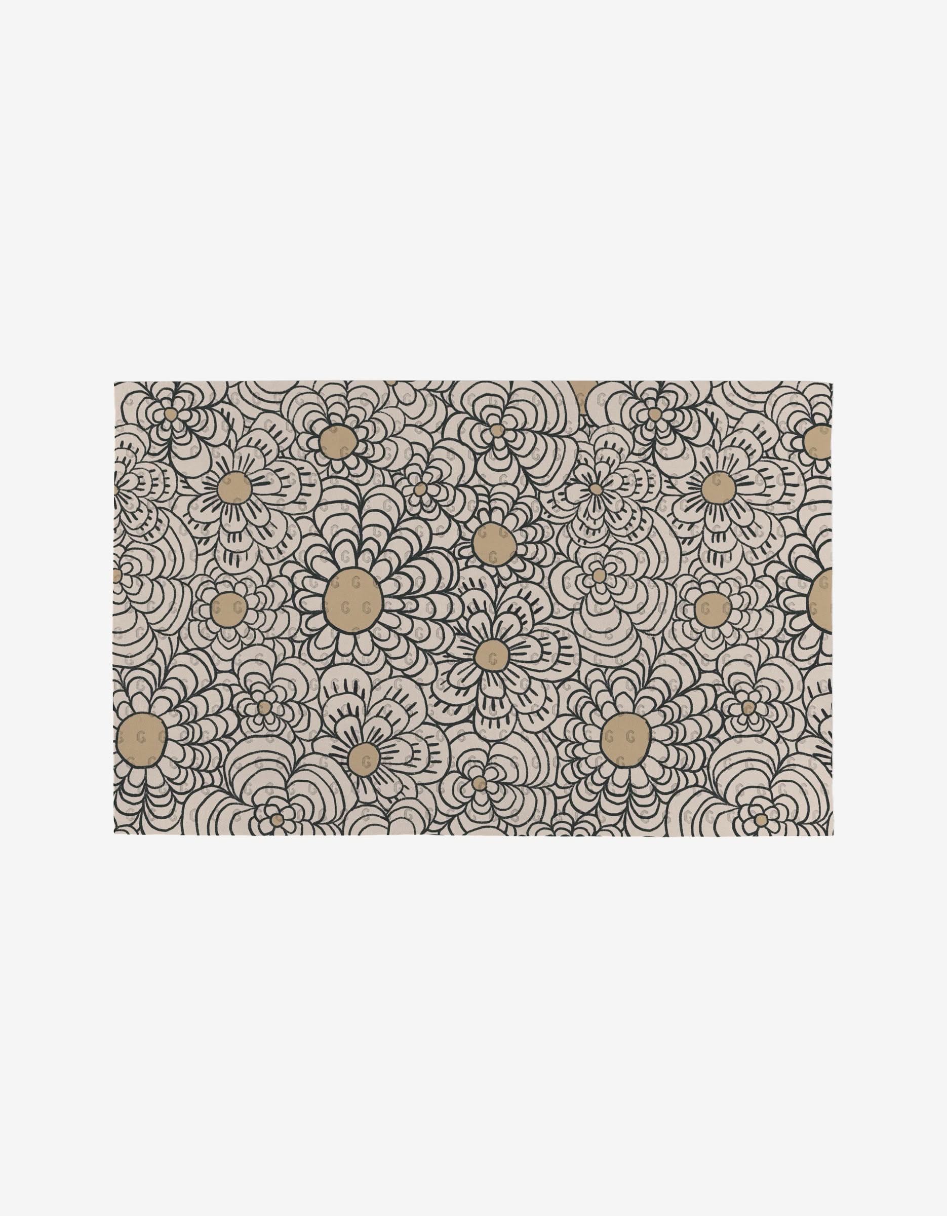 The Paulette mat by Amy MacCready features an intricate hand-drawn black floral pattern with gold circles on beige, crafted from eco-friendly post-consumer recycled materials.