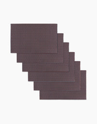 Picnic Parade by Geometry: six reusable, eco-friendly rectangular placemats with a dark brown and white checkered pattern, shown stacked on a white background—an ideal alternative to paper towels.