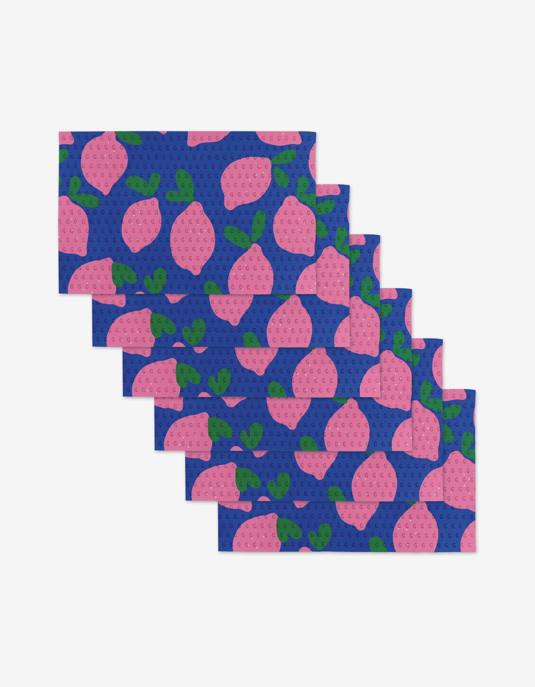 Six Pink Lemons rectangular napkins by Jennifer Bouron, featuring pink strawberries and green leaves on a blue polka dot background, fanned out. An eco-friendly alternative to Not Paper Towels.