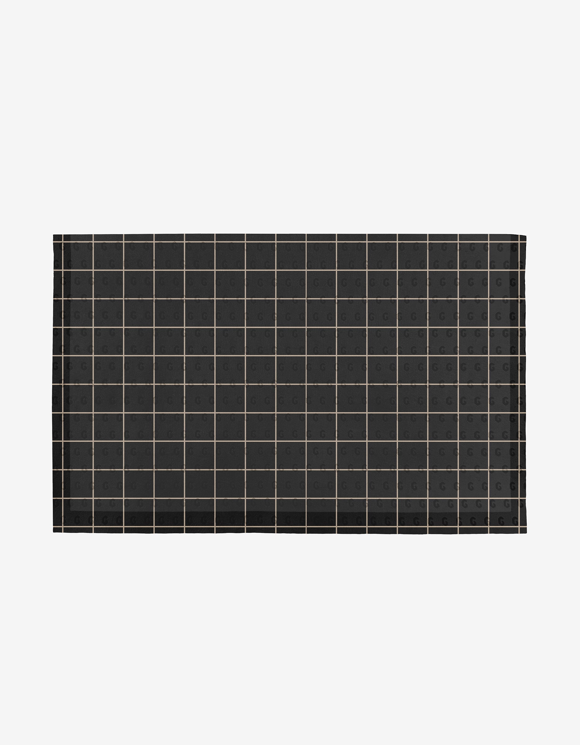 The Plant One on Me mat by Aubrey Fairchild is a rectangular black mat with a grid of thin light lines and small G symbols in each square, made from eco-friendly post-consumer recycled materials. Displayed on white. Not Paper Towels.