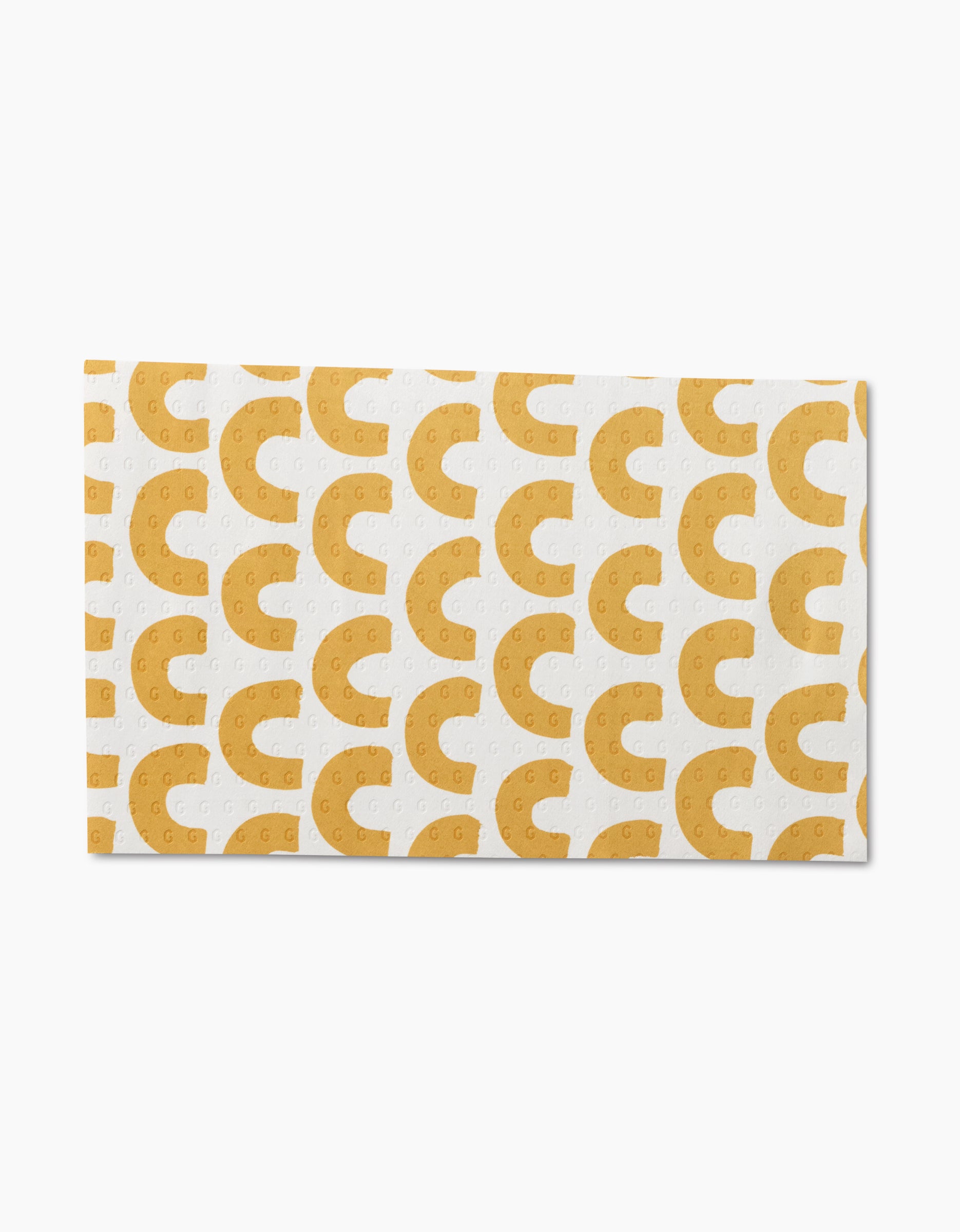 The GEOMETRY Pop Of Color Not Paper Towel features yellow crescent patterns dotted with circles on white and is made from post-consumer recycled materials—an eco-friendly, reusable alternative.