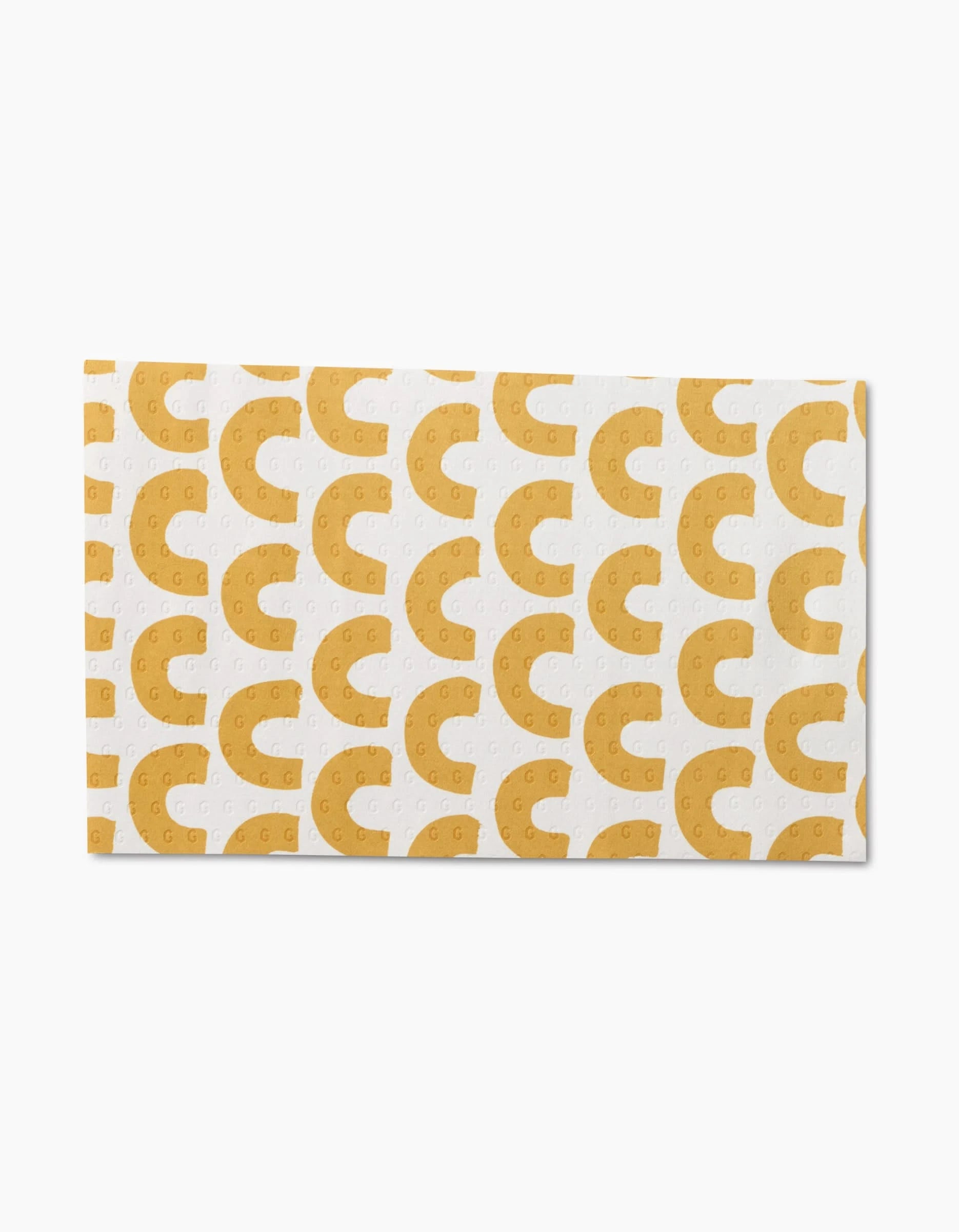 The GEOMETRY Pop Of Color Not Paper Towel features yellow crescent patterns dotted with circles on white and is made from post-consumer recycled materials—an eco-friendly, reusable alternative.