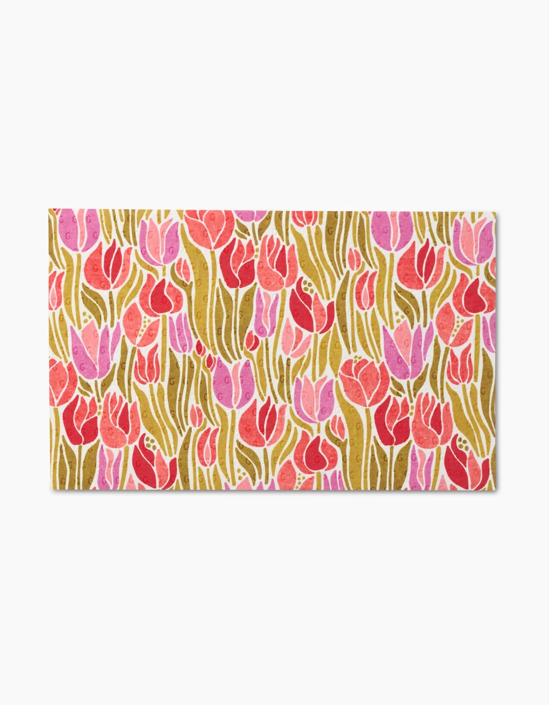 The Sidney mat by Amy MacCready showcases pink and red tulips with green stems on a mustard yellow background and is made from eco-friendly recycled materials.