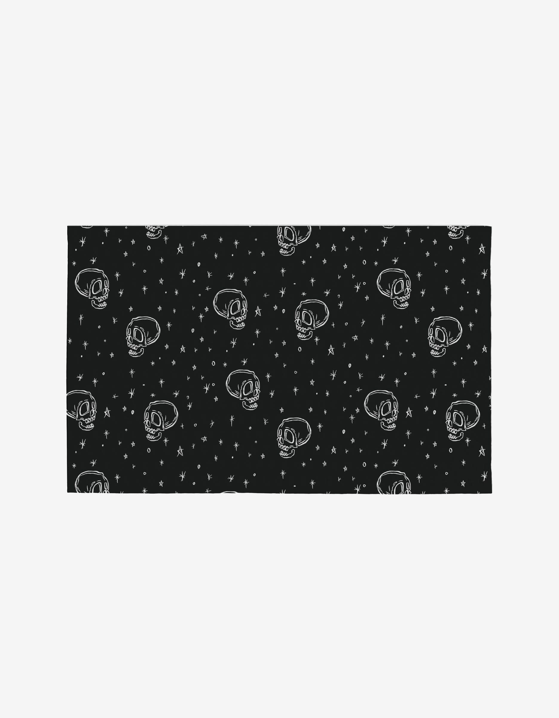 Aubrey Fairchild’s Skulls and Stars features rectangular black Not Paper Towels with a white astronaut skull and star pattern. Made from post-consumer recycled materials, they offer an eco-friendly, sci-fi-inspired alternative.