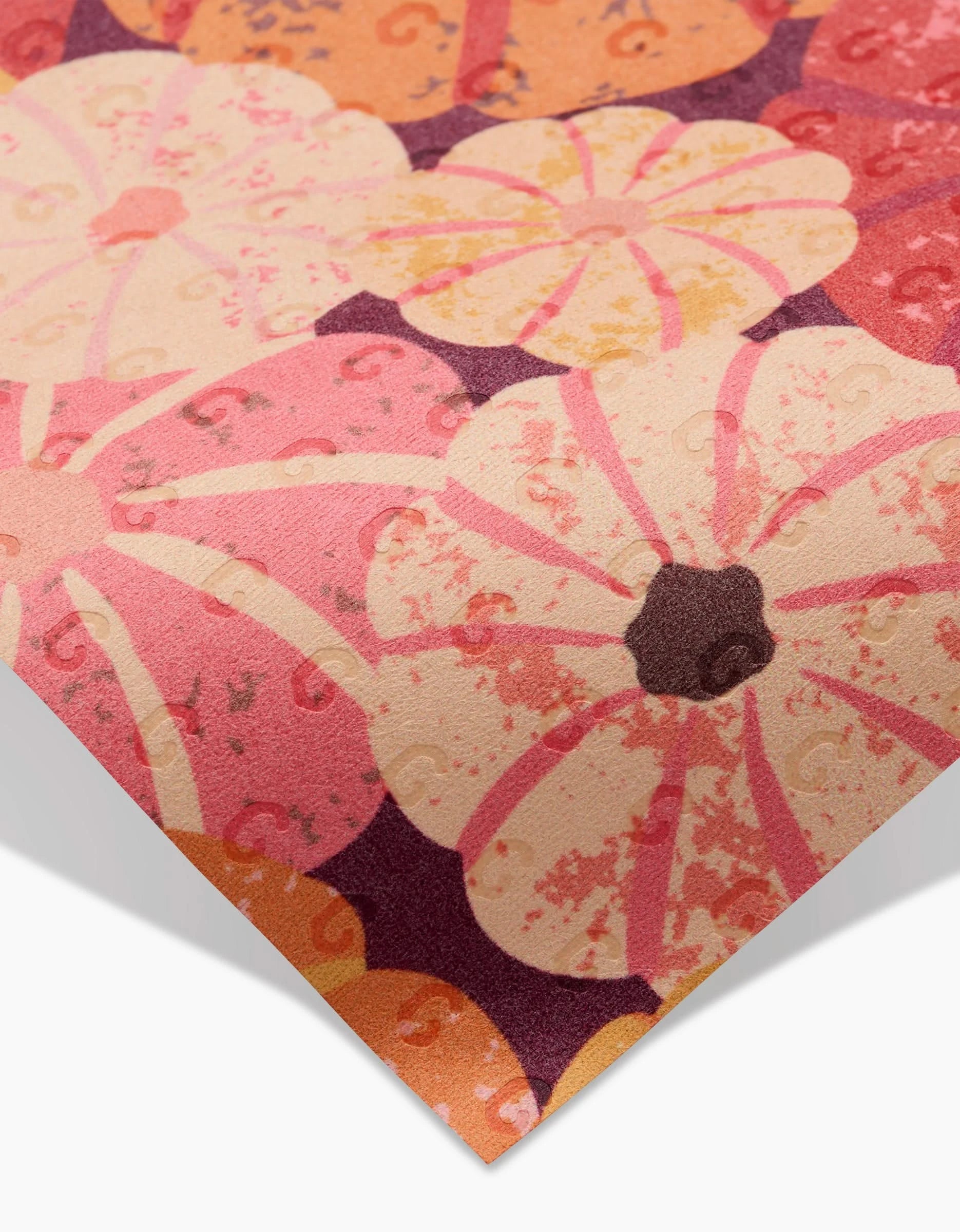 A close-up of Rebecca Bobkos Spicy Pumpkins Not Paper Towels, featuring stylized pumpkins in orange, pink, and peach on a maroon background—an eco-friendly kitchen towel alternative.