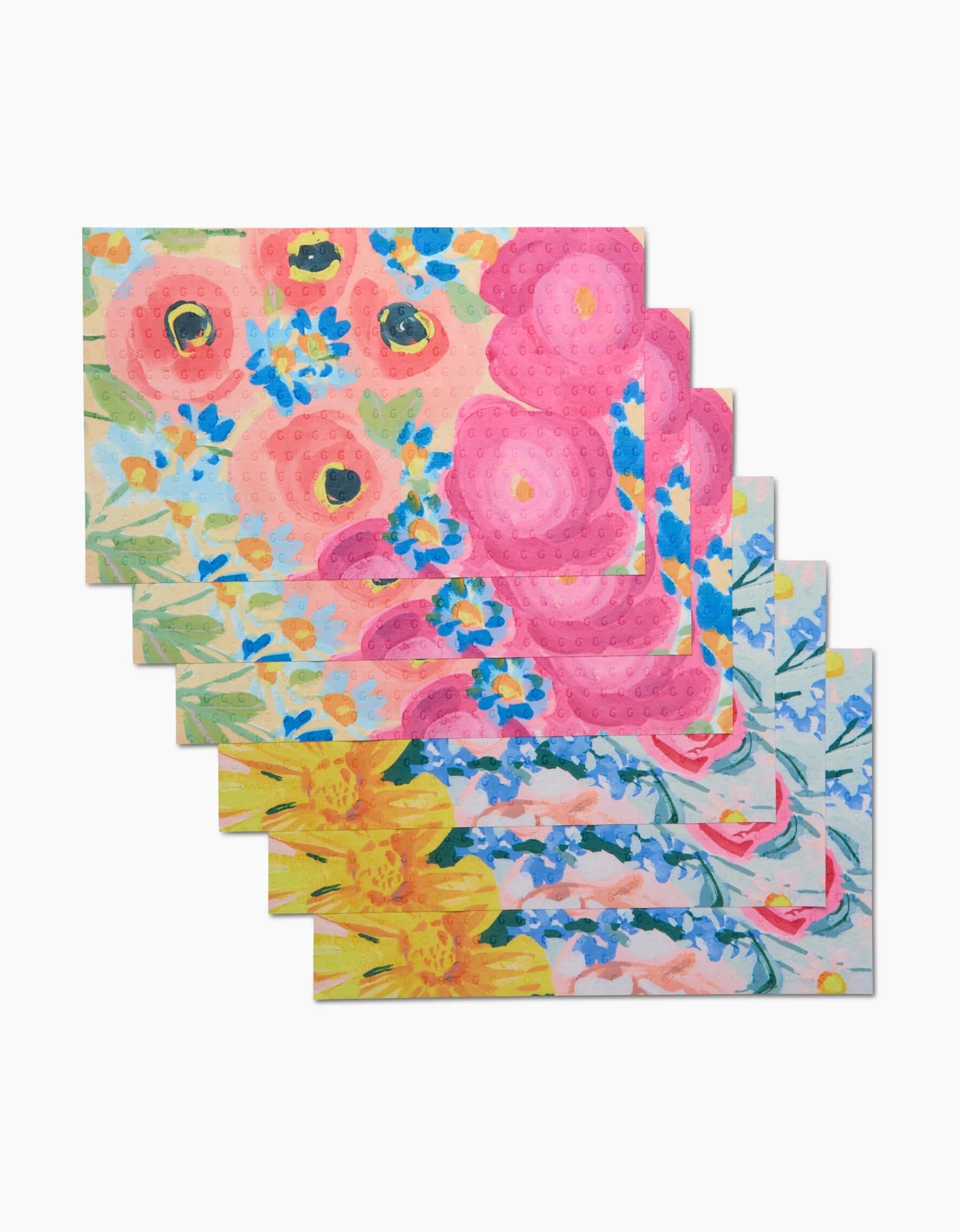 Suzzy and Margot by Ania Zwara Art: a set of six rectangular cloths with vibrant pink, yellow, orange, and blue floral patterns on a light background—an eco-friendly alternative to Not Paper Towels—arranged in a staggered overlap.