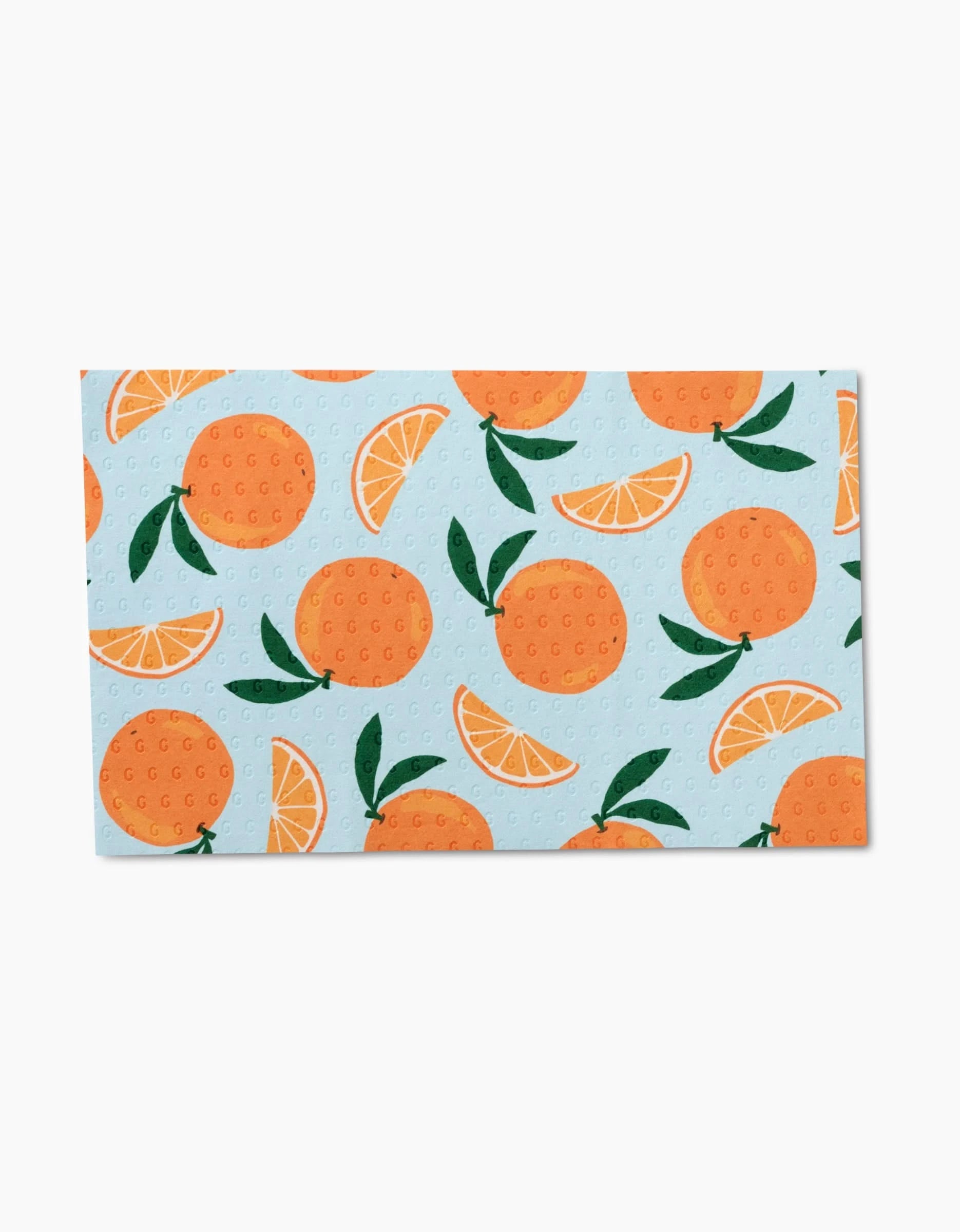 Sweet Summer Mix 1 by GEOMETRY is a rectangular cloth made from eco-friendly recycled materials, featuring whole oranges, orange slices, and green leaves on a light blue background. Perfect as a reusable Not Paper Towel.