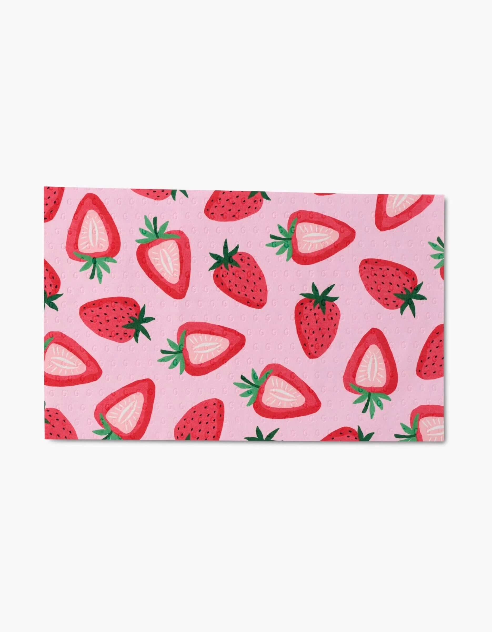Sweet Summer Mix 1 by GEOMETRY is a rectangular pink cloth featuring whole and sliced strawberries with green leaves, arranged randomly. Its an eco-friendly alternative to Not Paper Towels.