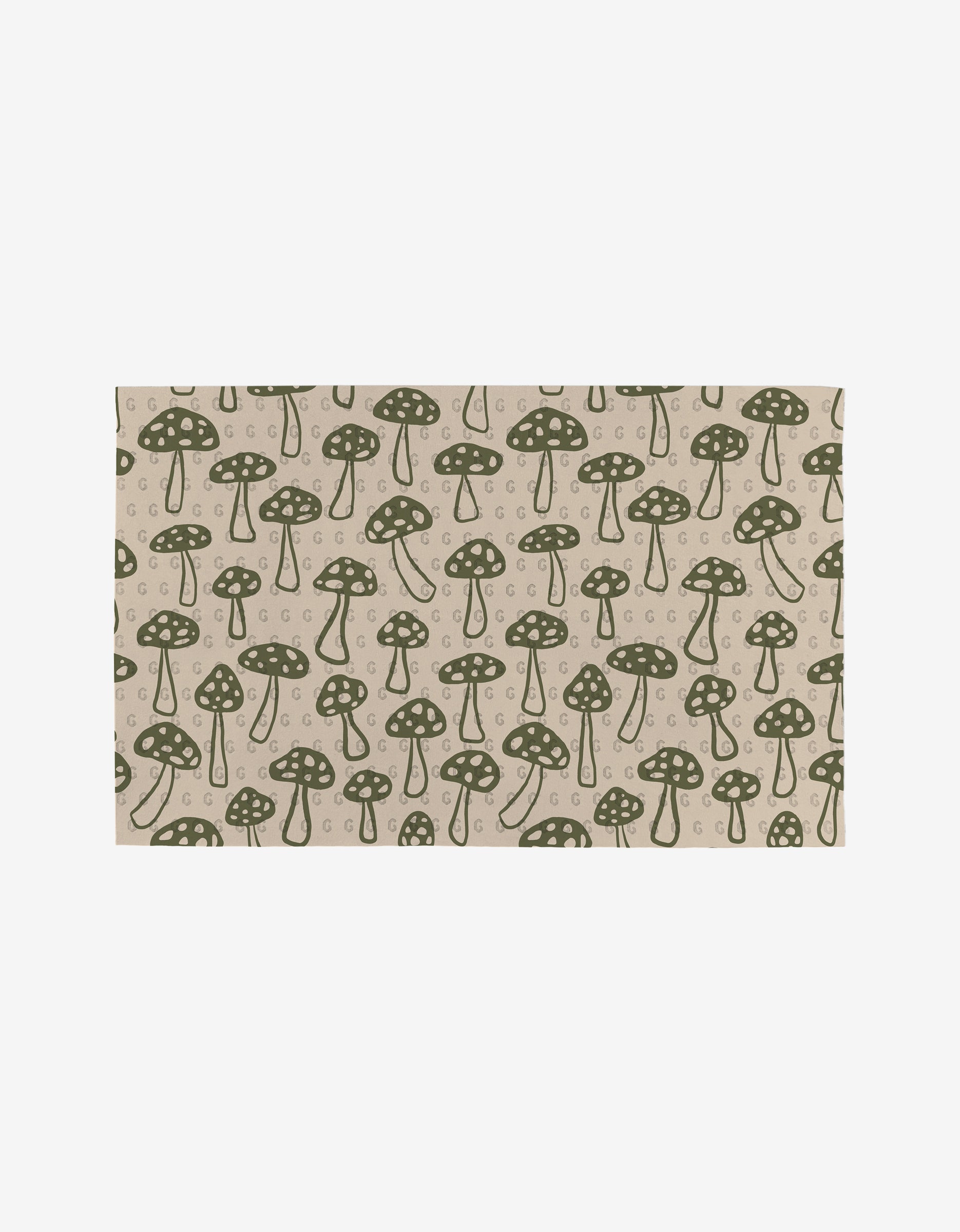 The Woodland Mushroom mat by Kayla Ann is a beige rectangular rug with a repeating hand-drawn dark green mushroom pattern and circular accents, made from eco-friendly post-consumer recycled materials.