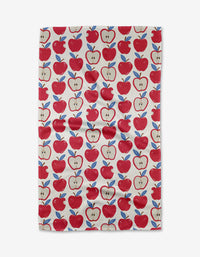 Apple A Day by Hufton Studio is a white tea towel with whole and halved red apples and blue leaves. Made from Geoweave fabric, it brings a bright, cheerful touch to any kitchen.