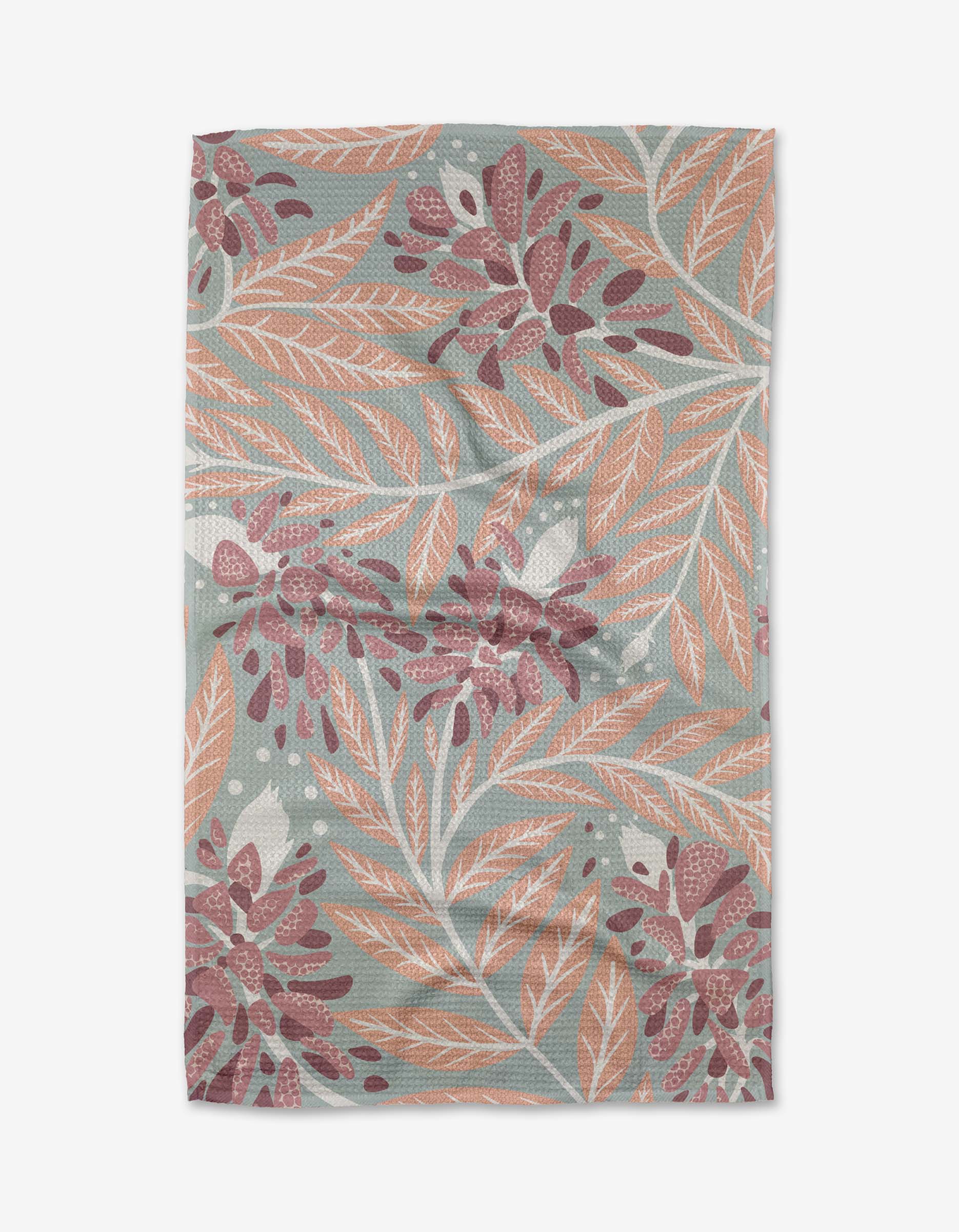 The Bluebonnet Kitchen Tea Towel by Julianne Haness features orange leaves and burgundy clusters on pale blue Geoweave Fabric, offering a subtle texture and visible creases.