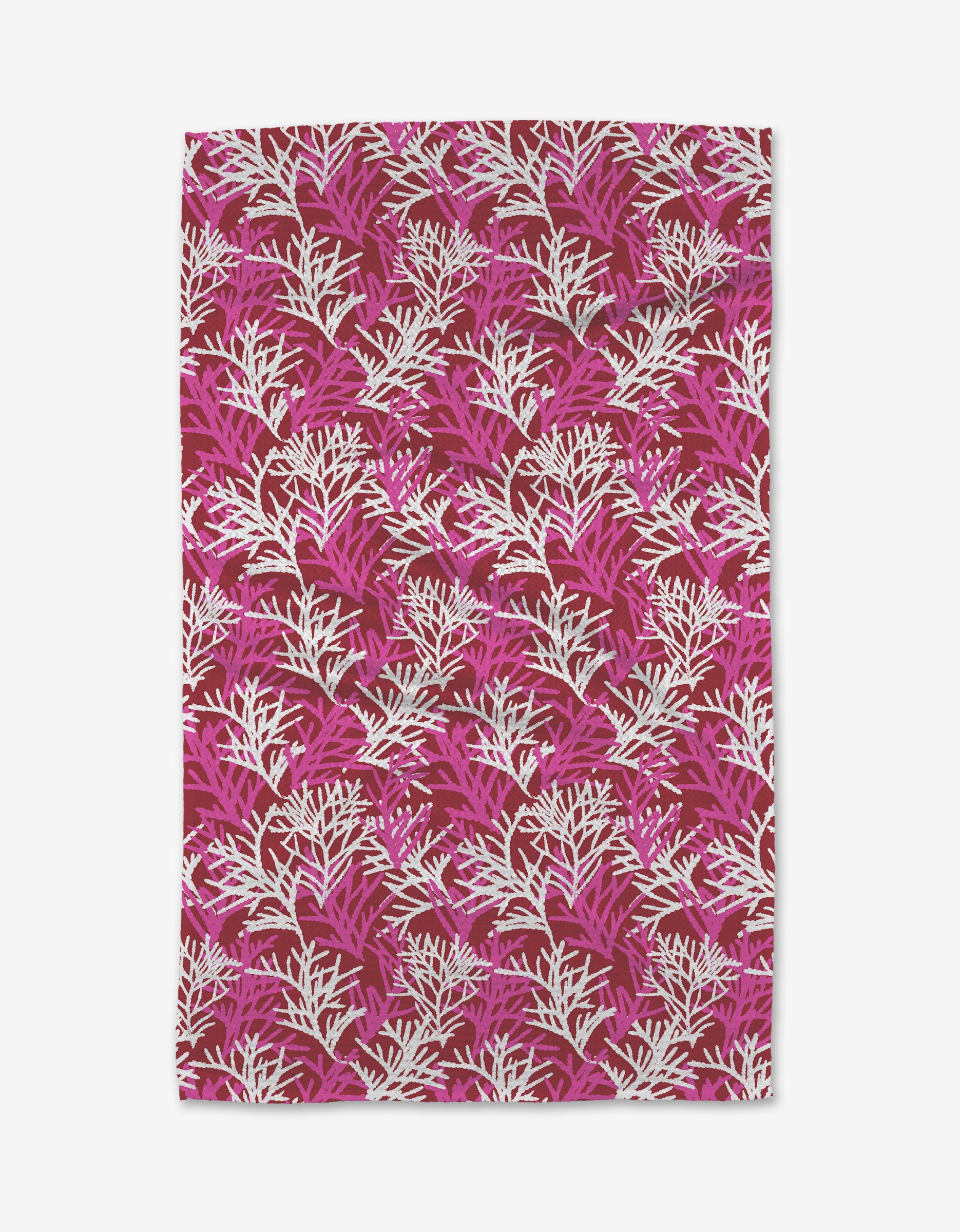 The Cedar Pine Tea Towel by Kayla Ann features a repeating botanical pattern of white and pink leafy branches on deep red Geoweave fabric for a vibrant look.