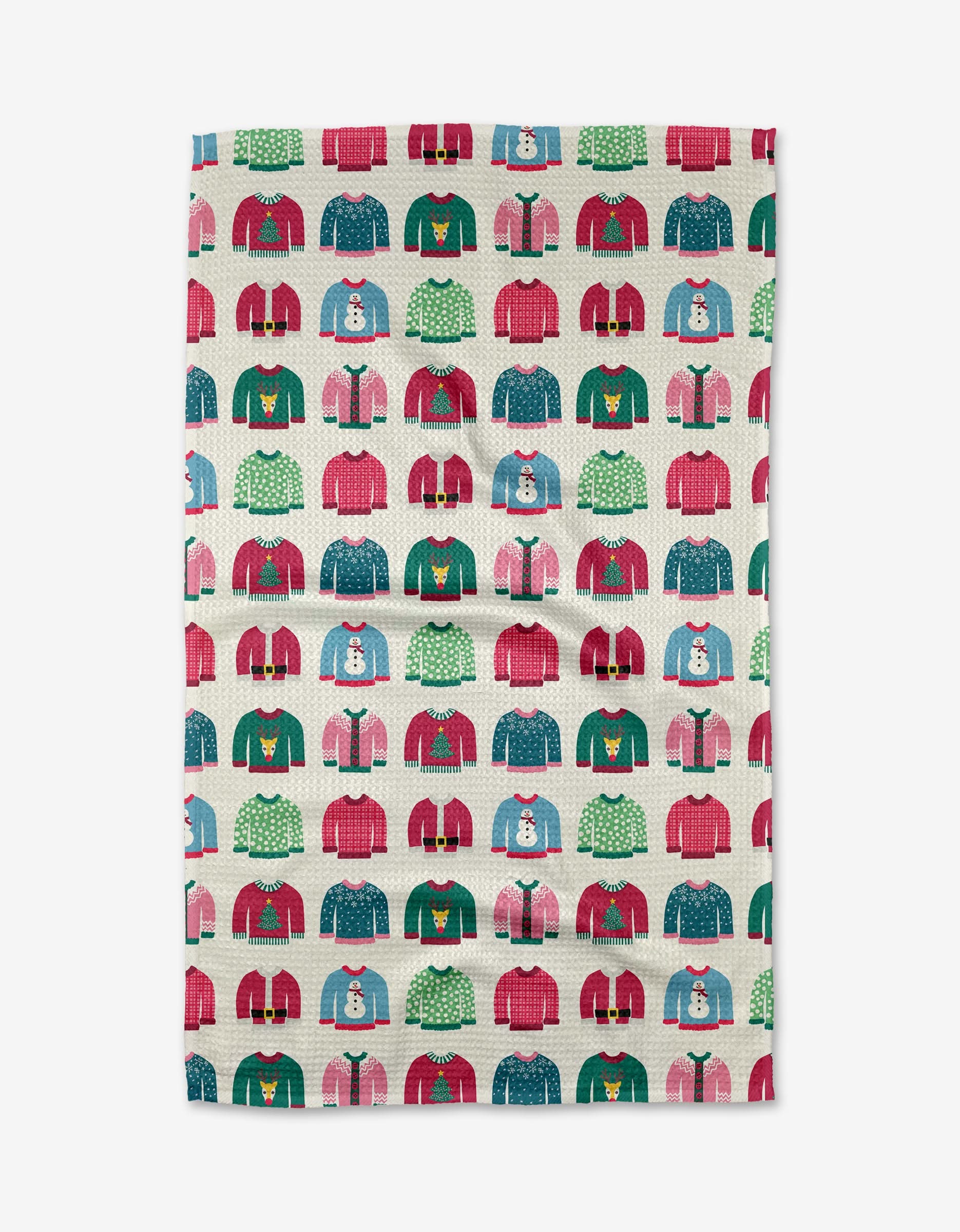 The Rebecca Bobko Christmas Sweaters kitchen towel features a festive pattern of red, green, and blue sweaters adorned with snowflakes, trees, and snowmen—perfect for adding holiday cheer to your kitchen.