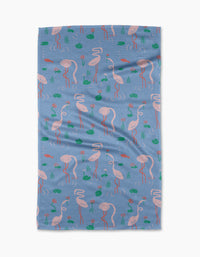 The Flirty Flamingo by Elisabeth Wing is a blue blanket crafted from recycled materials, adorned with pink flamingos and green lily pads in a playful repeating pattern.