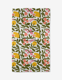 The Lisa Nelson Fresh Vines tea towel features a repeating pattern of yellow, pink, and orange abstract flowers with green leaves on a white Geoweave fabric background. The cloth has a slightly wrinkled appearance.