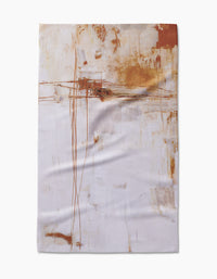 Frictions by Jennifer Janesko is a white Geoweave™ Fabric tea towel featuring an abstract design with brown and rust brush strokes and lines for a modern, artistic look.