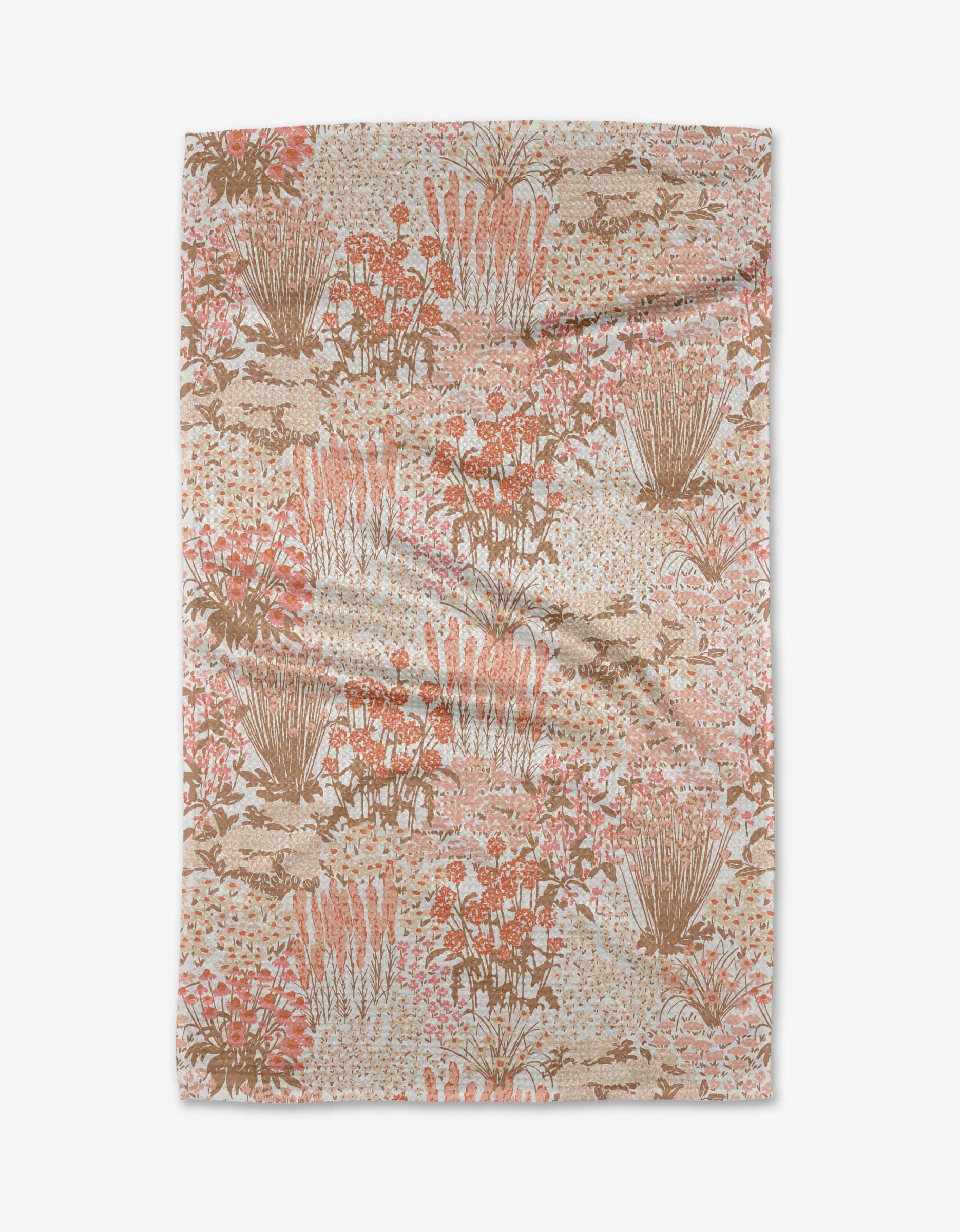 The Hufton Studio Garden Bloom blanket features a soft beige base with pink, brown, and cream floral and foliage patterns, inspired by nature and crafted from recycled materials. Shown flat on a white background.