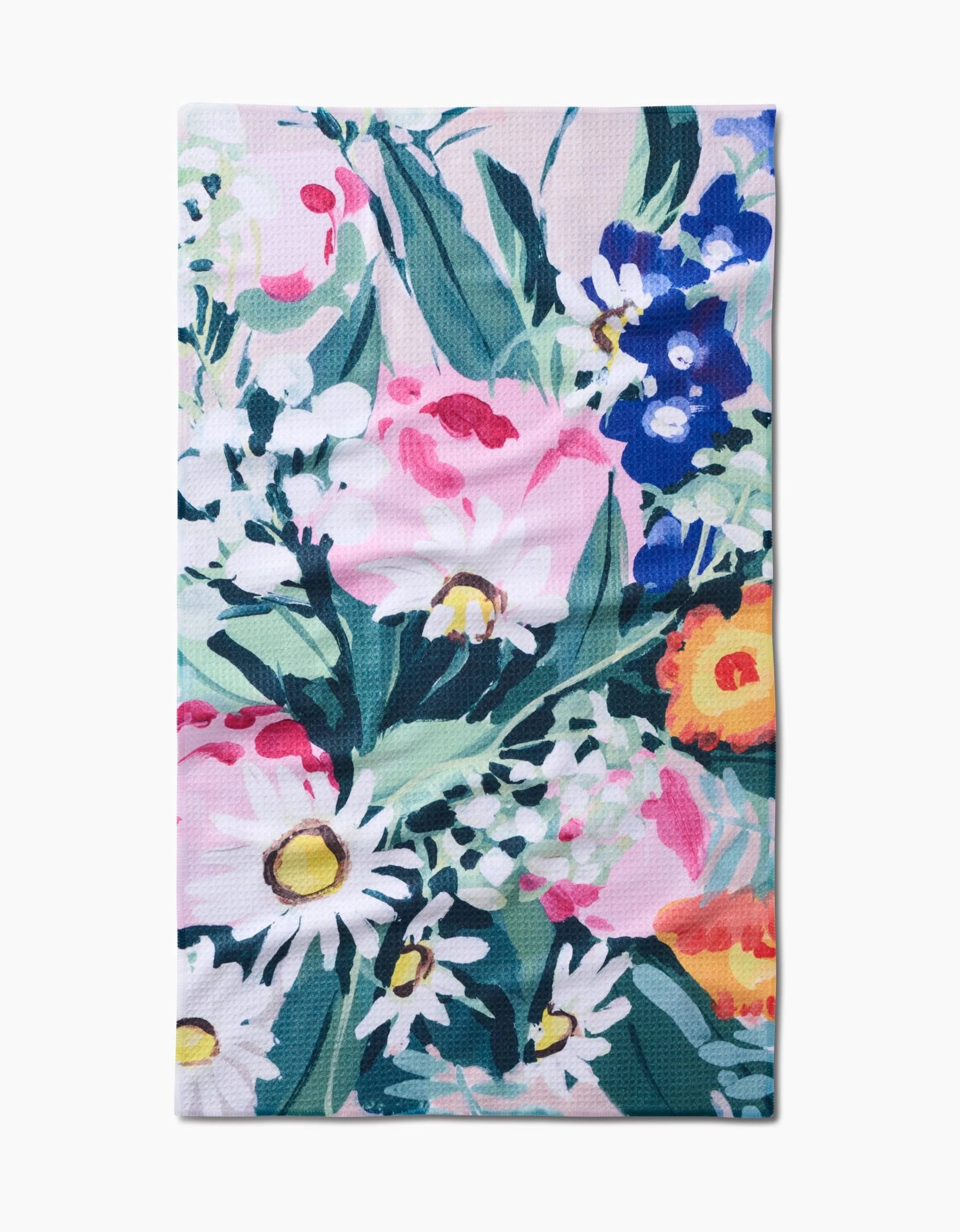 The Garden Bouquet Tea Towel by Ania Zwara Art features a vibrant floral design with daisies, pink roses, and green leaves on white—crafted from ultra-absorbent Geoweave fabric.