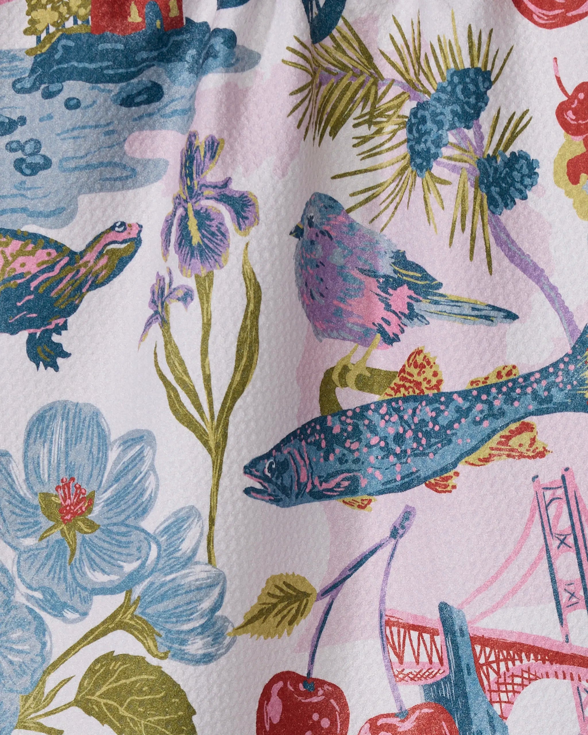 The Geometry "Greetings From Michigan" towel features a colorful illustration with a turtle, fish, bird, flowers, pine branches, cherries, and part of a bridge in vibrant blue, pink, green, and red on an ultra-absorbent fabric.