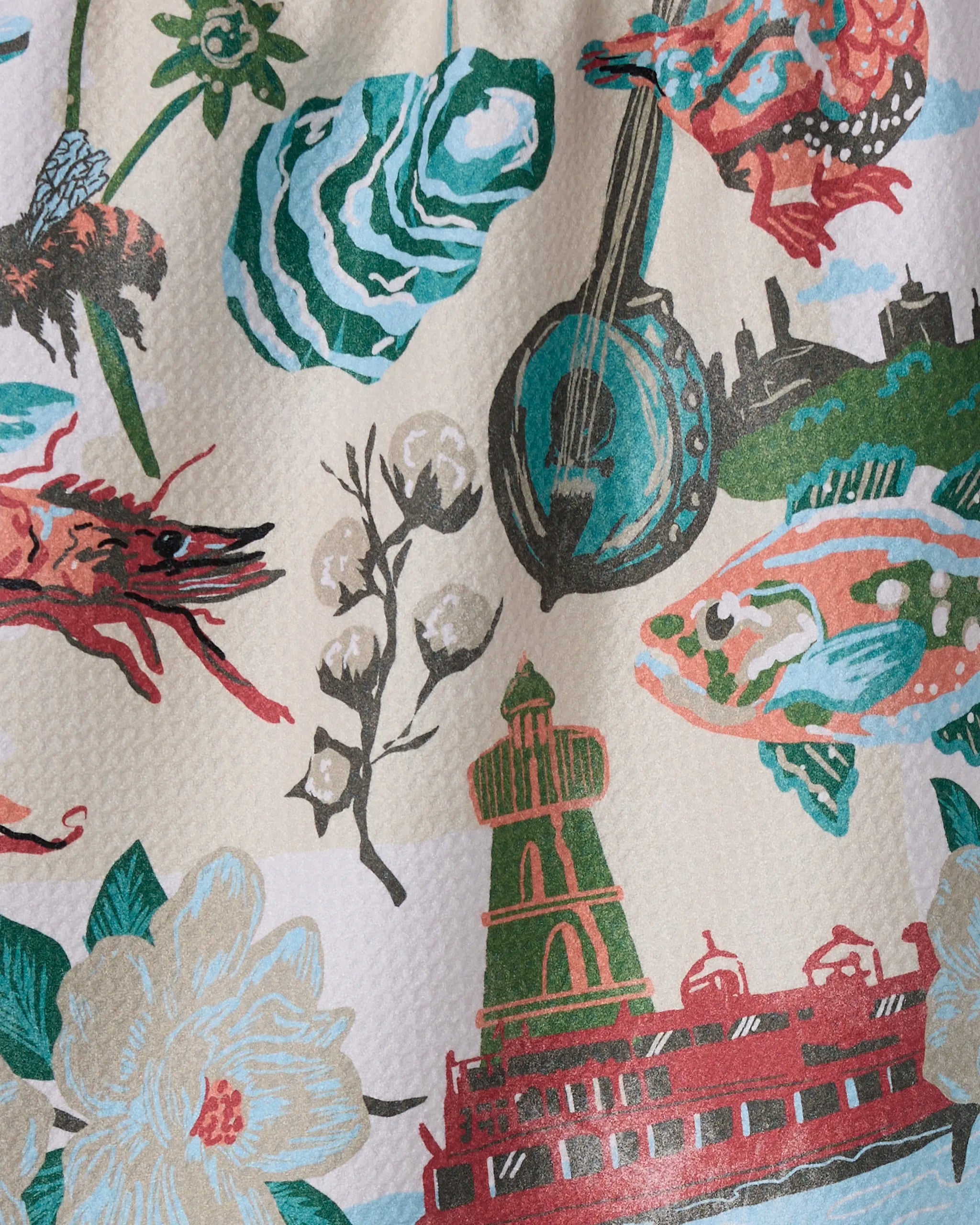 The "Greetings From Mississippi" tea towel by Geometry showcases vibrant state-inspired illustrations and is crafted from ultra-absorbent recycled materials—perfect for adding color and function to your kitchen.