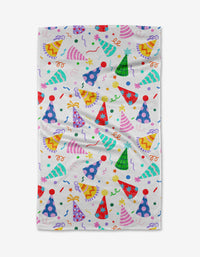 The Hats Off tea towel by Vaishali Design Studio features a vibrant party-themed pattern and is crafted from quick-drying recycled materials for an eco-friendly touch.