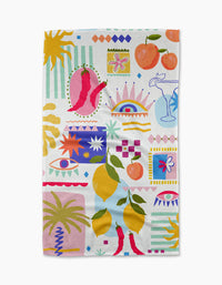 The Italian Picnic recycled kitchen towel by Marina Solodka features playful illustrations of lemons, oranges, chili peppers, cocktail glasses, palms, geometric shapes, suns, eyes, and abstracts on a white background.