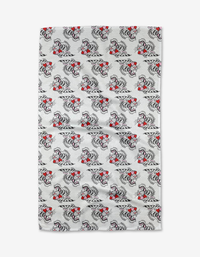 A rectangular tea towel by Cole Strem named Love Tiger, featuring repeating black and white tiger patterns with red bowties on a white dotted background, crafted from recycled materials.