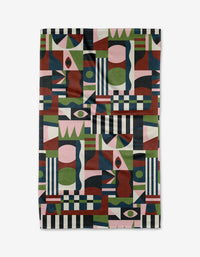 Modern Bauhaus Mood by Claire Iglesias is a rectangular textile made from ultra-absorbent Geoweave fabric, featuring abstract shapes, stripes, stylized eyes, and a geometric design in green, pink, burgundy, black, and cream.