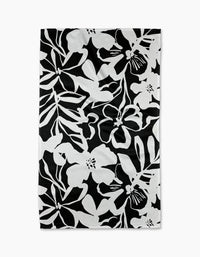 The Night Meadow dish towel by Marina Solodka features a bold black and white floral pattern—ideal as an eco-friendly kitchen or tea towel.