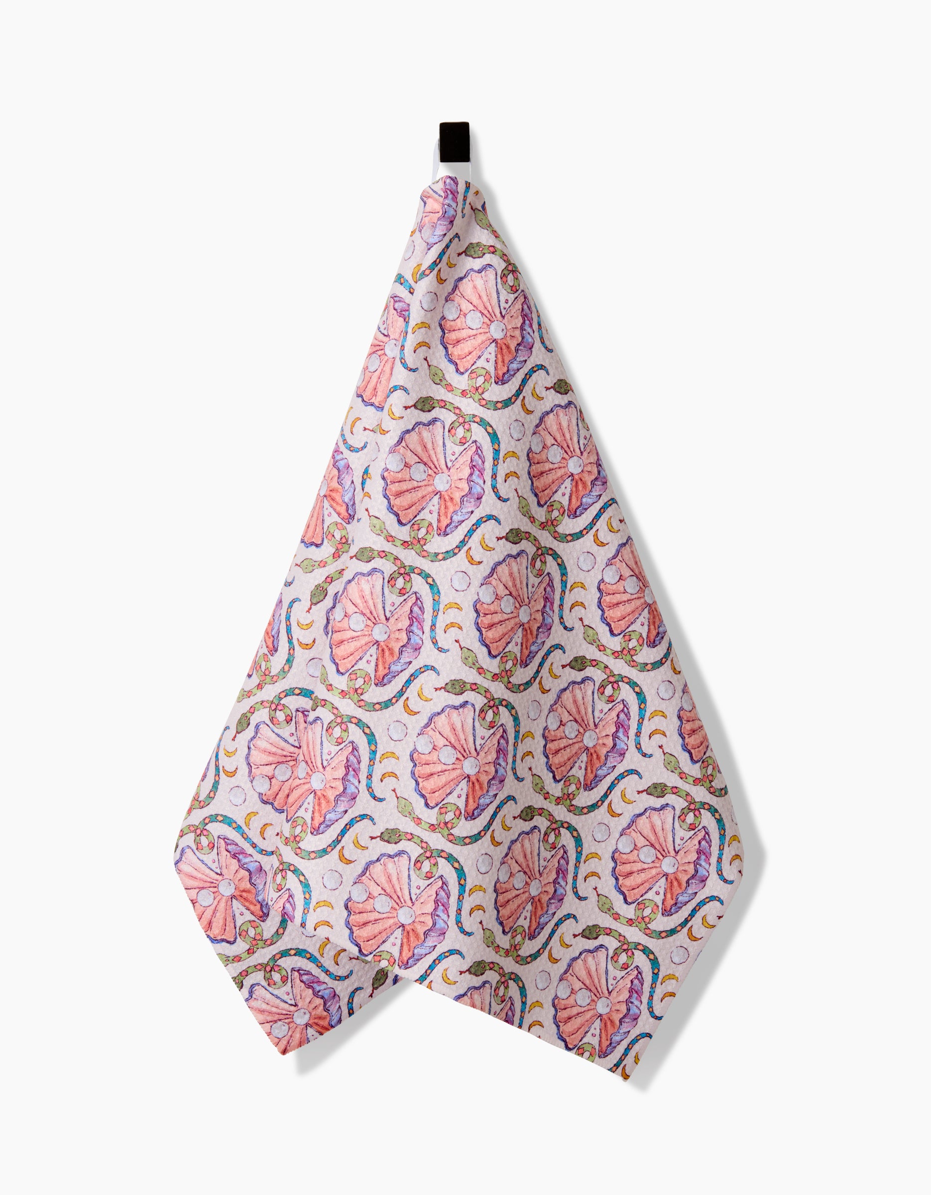The Pearls Of The Moon tea towel by Maayan Alper-Swan, made from ultra-absorbent Geoweave fabric, showcases pink floral patterns with green, blue, and orange accents and hangs from a black loop against a white background.