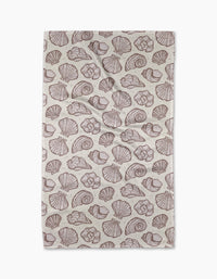 The Retro Coastal Seashells in Neutral tea towel by Teri the Butter features a repeating brown seashell pattern on beige, including scallops and spirals. Made from recycled materials, its shown flat with slight creases.