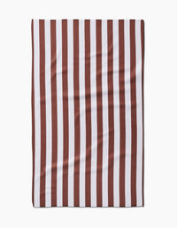 The Kailee Wright Toni Stripe Geoweave™ tea towel features vertical dark red and white stripes and a slightly wrinkled texture, shown laid flat on a white background.