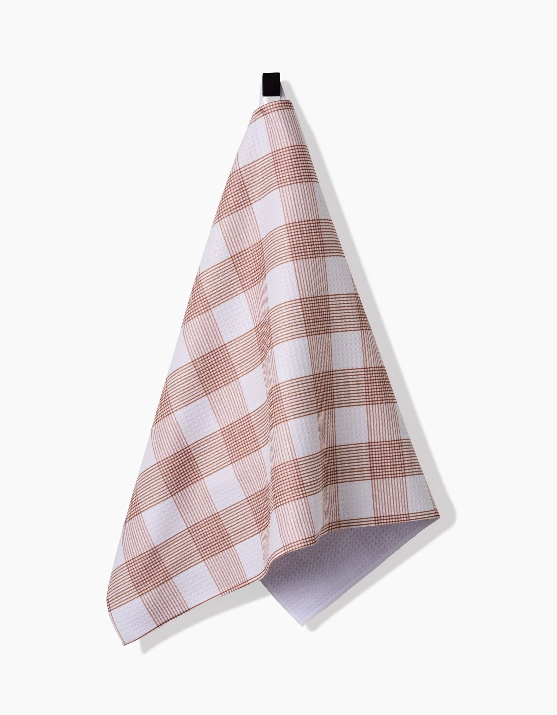 The Hufton Studio Vintage Gingham Natural tea towel, crafted from durable Geoweave fabric, features a red and brown checkered pattern and hangs from a black loop against a white background.
