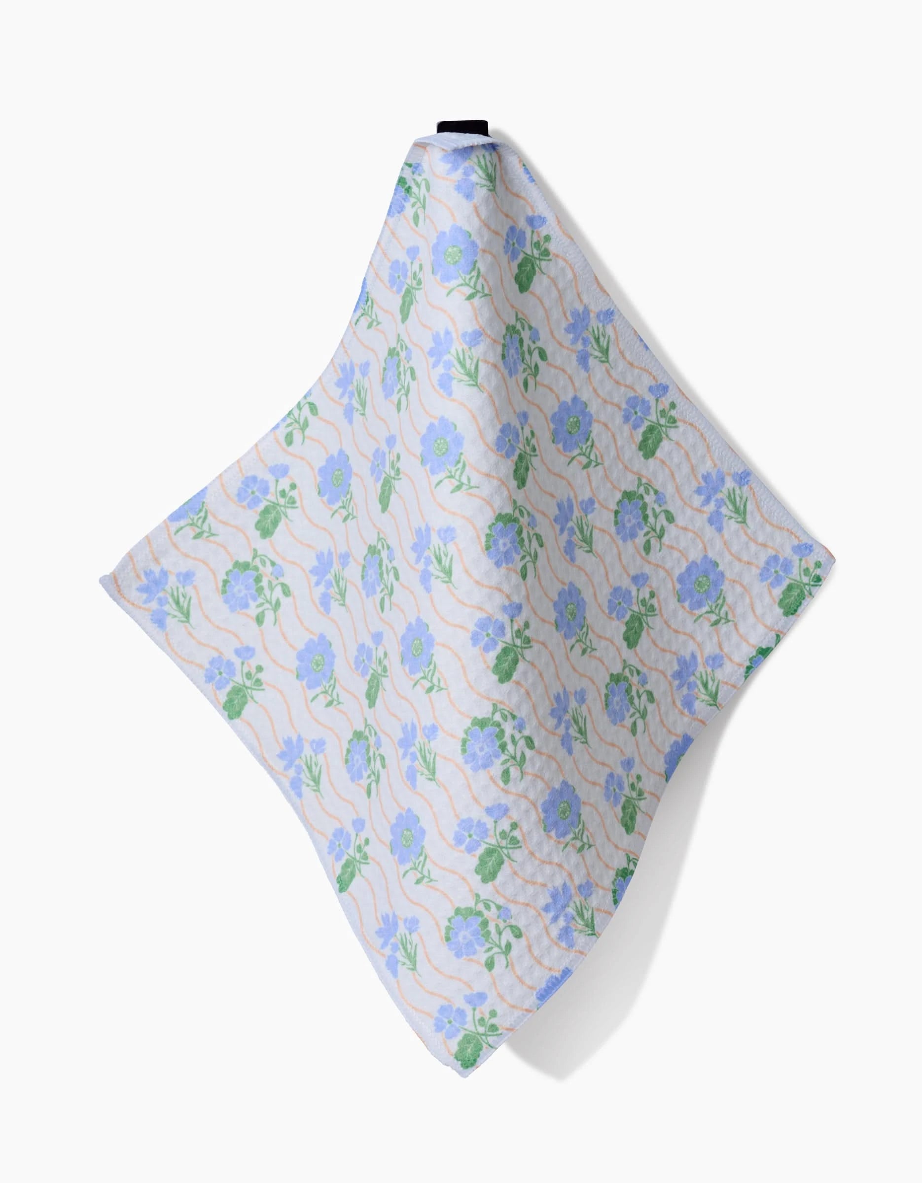 The Danelys Sidron Morning Wave is a square cloth napkin featuring pastel blue, green, and beige floral patterns on a light background. Made with ultra-absorbent Geoweave technology for a luxurious washcloth feel.