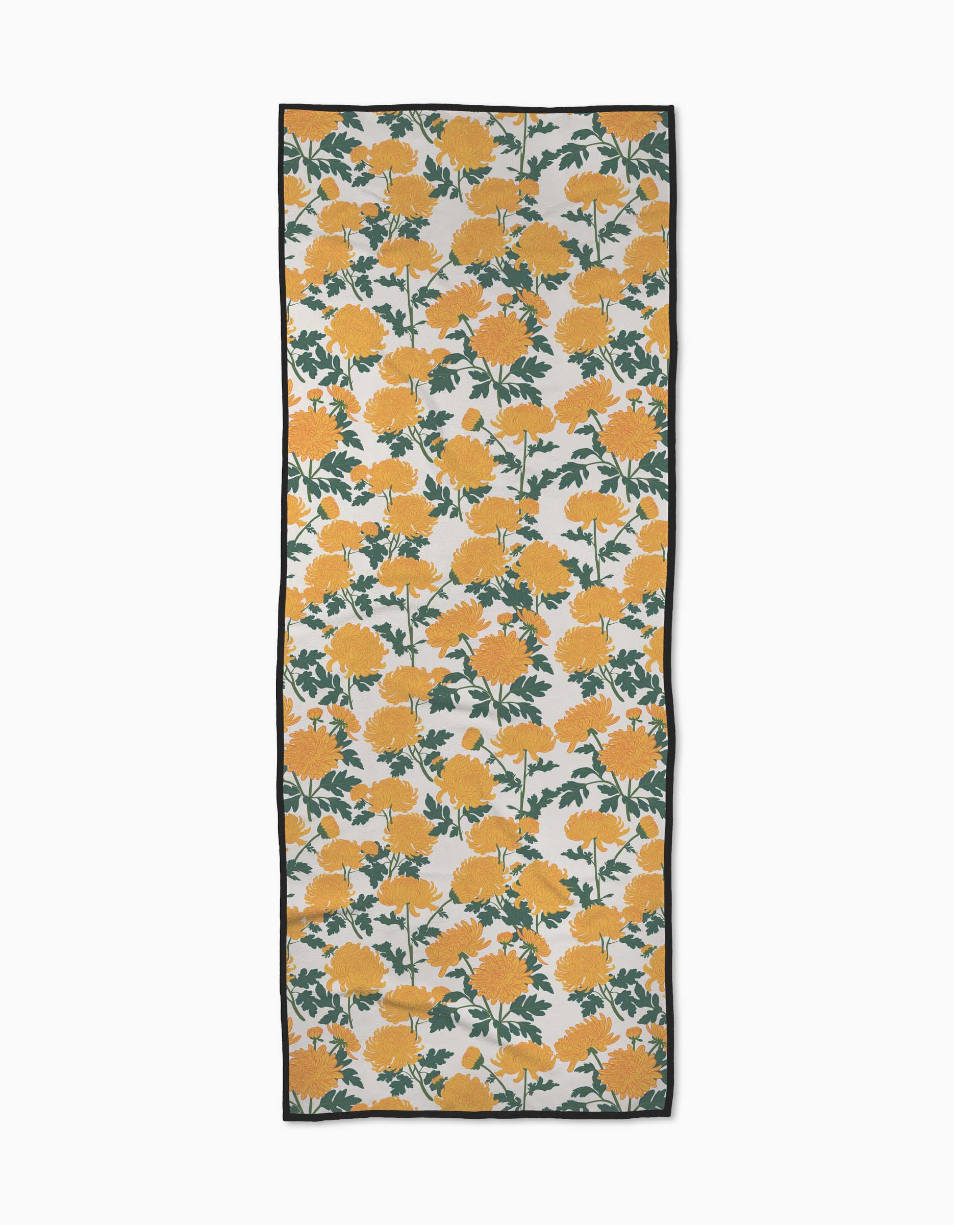 The Chrysanthemum yoga towel by Vaishali Design Studio features large yellow flowers with green leaves on white, bordered by a dark edge. This rectangular towel is slip-resistant—perfect for enhancing your yoga practice.