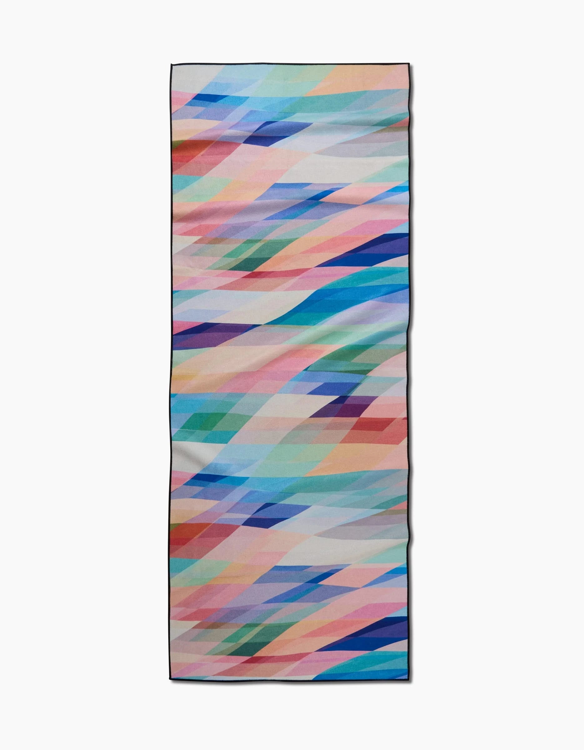 Eventide by Rachel Parker is a rectangular yoga towel crafted from recycled materials, featuring a geometric pattern of overlapping pastel shapes in blue, pink, orange, and green on a light background.