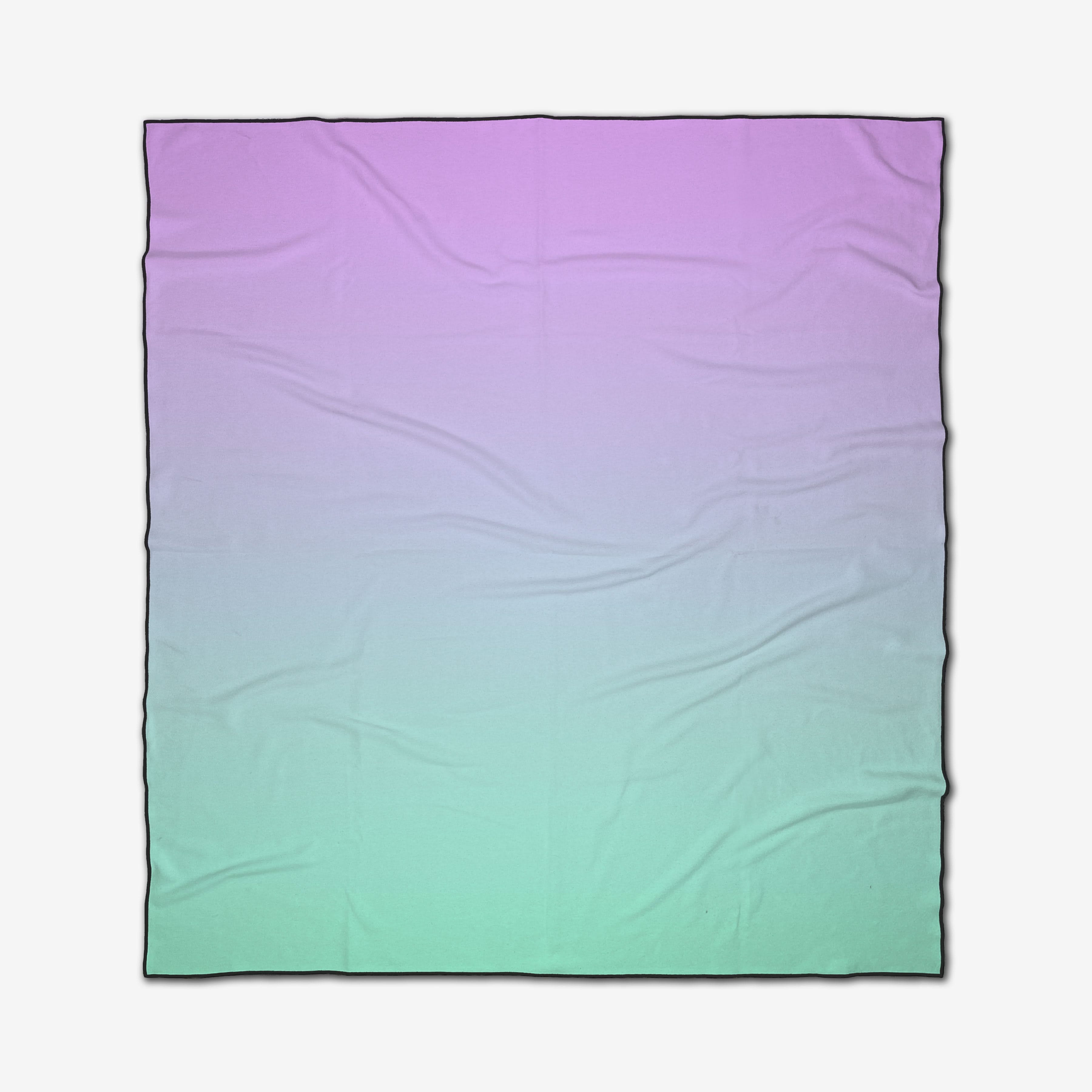 The GEOMETRY Cotton Candy beach blanket features a square shape, quick-dry fabric, and a soft gradient from light purple to mint green, shown laid flat with subtle creases.