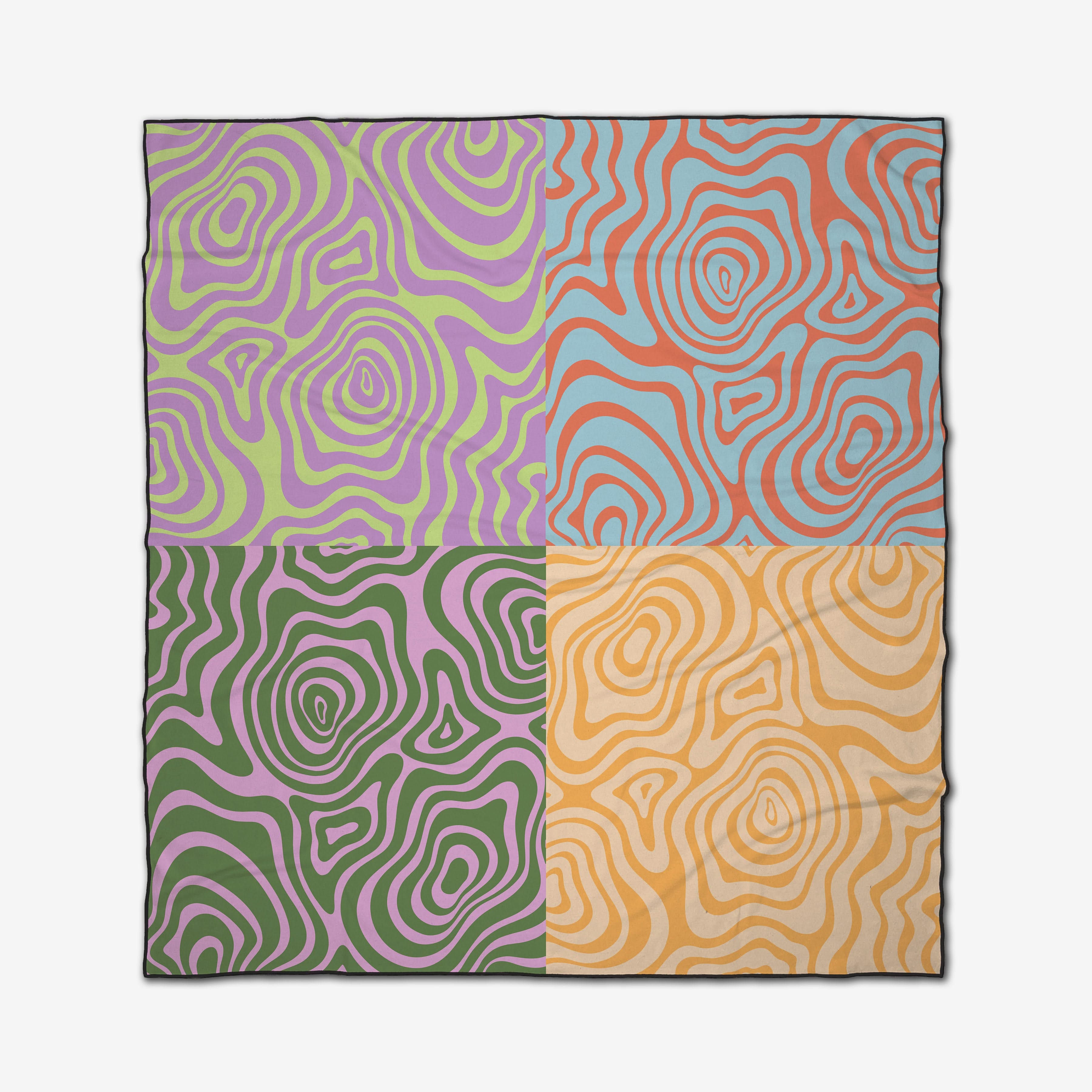 The GEOMETRY Squiggly beach blanket is a square design made from recycled materials, featuring four quadrants with wavy patterns in bold color pairs: purple/green, blue/orange, green/pink, and yellow/beige.