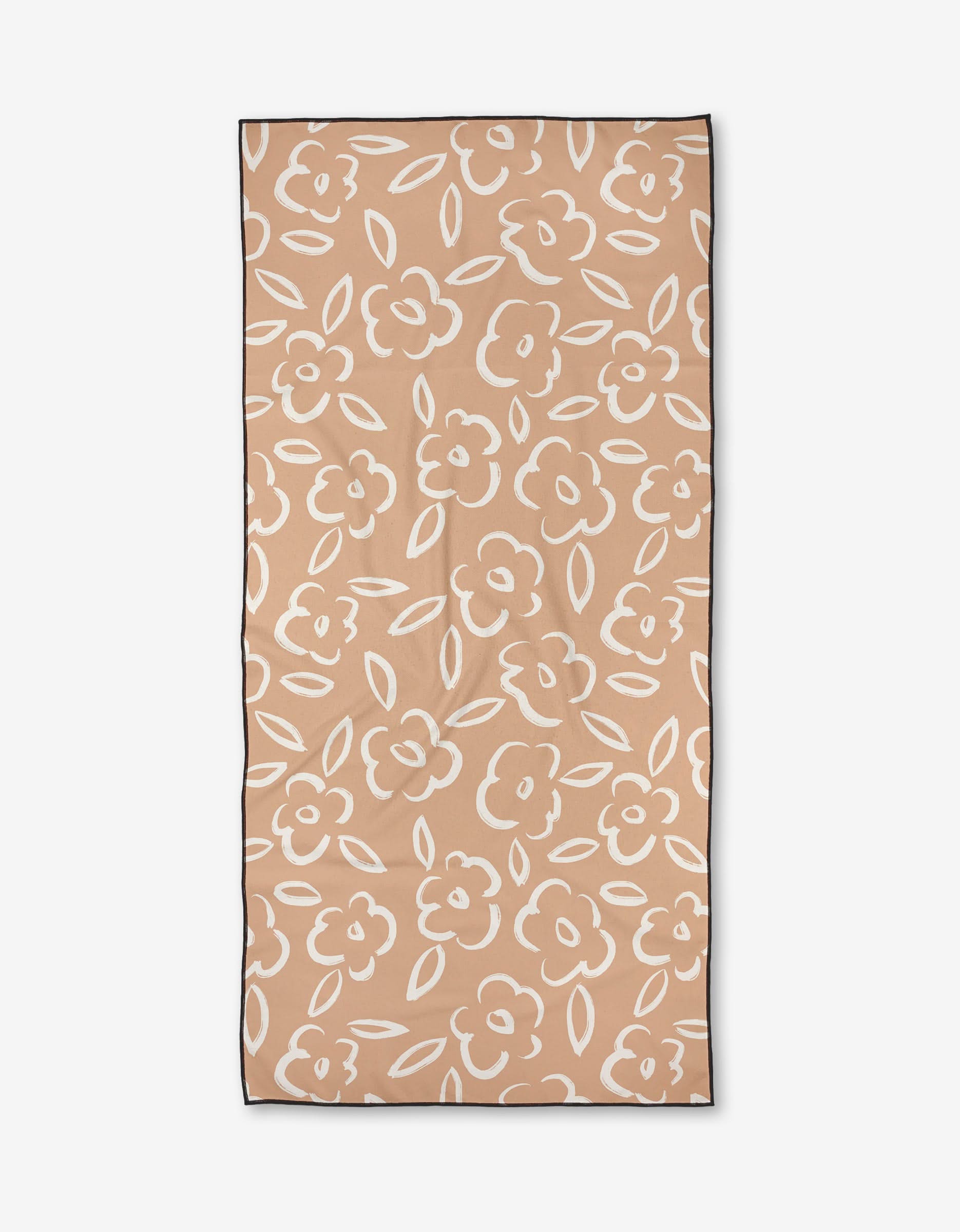 The Painted Bloom towel by Hufton Studio features a rectangular beige micro-loop fabric with white outlined floral and leaf patterns, bordered by a thin black edge, shown flat against a white background.