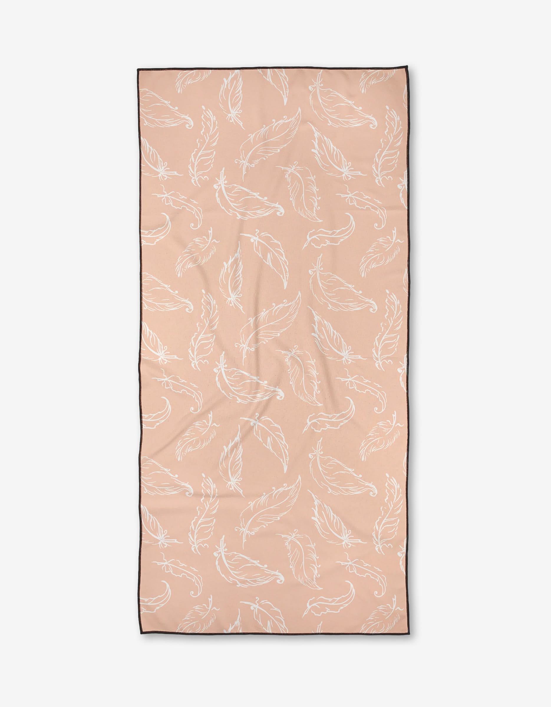 The Peachy Dream Micro-loop Beach Towel by Elena Fay is a rectangular, peach-colored towel with white feather outlines and a slim black border, made from recycled materials for eco-friendly style.