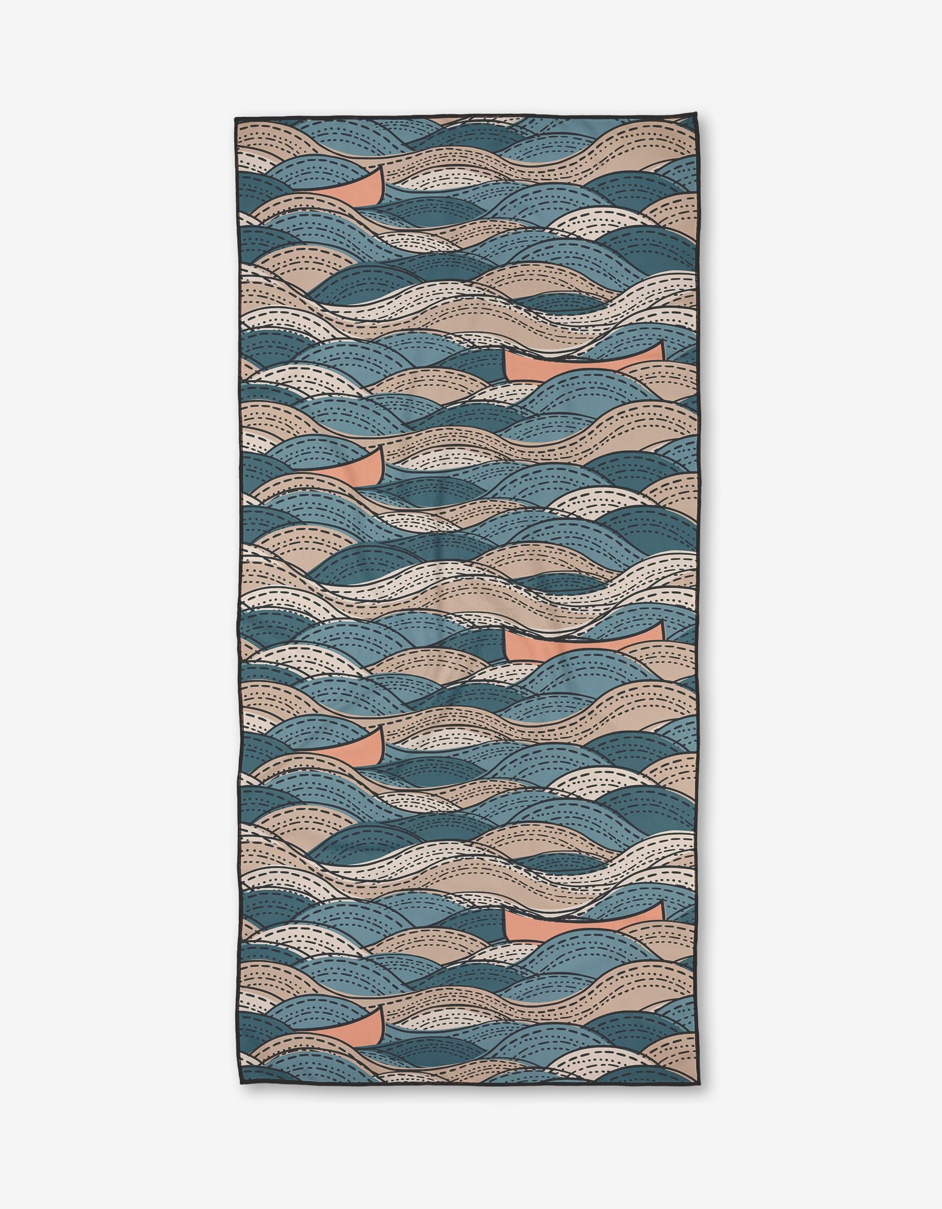 Twig + Spark Squall Micro-loop Beach Towel: Rectangular towel with abstract wave patterns in blue, beige, cream, and tan on a white background. Crafted from quick-drying recycled materials.