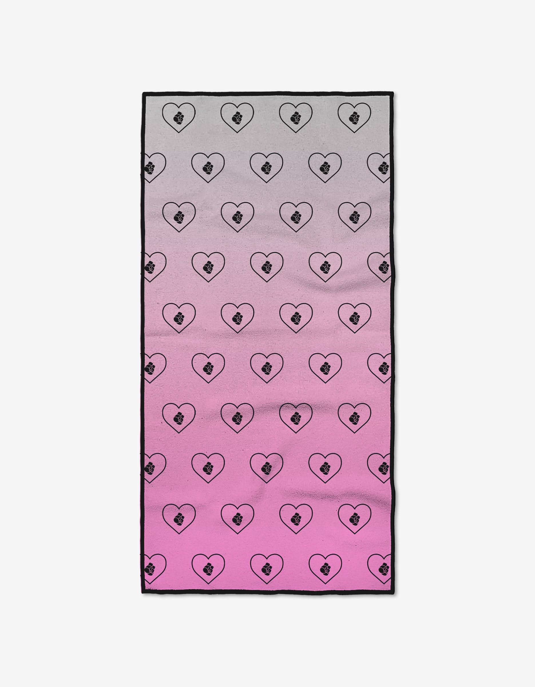 The Fight with Heart fitness towel by Ashley Guarrasi features a gradient from light gray to pink and a repeating heart-and-padlock pattern. Made from ultra-absorbent recycled materials, it’s perfect for your workout.