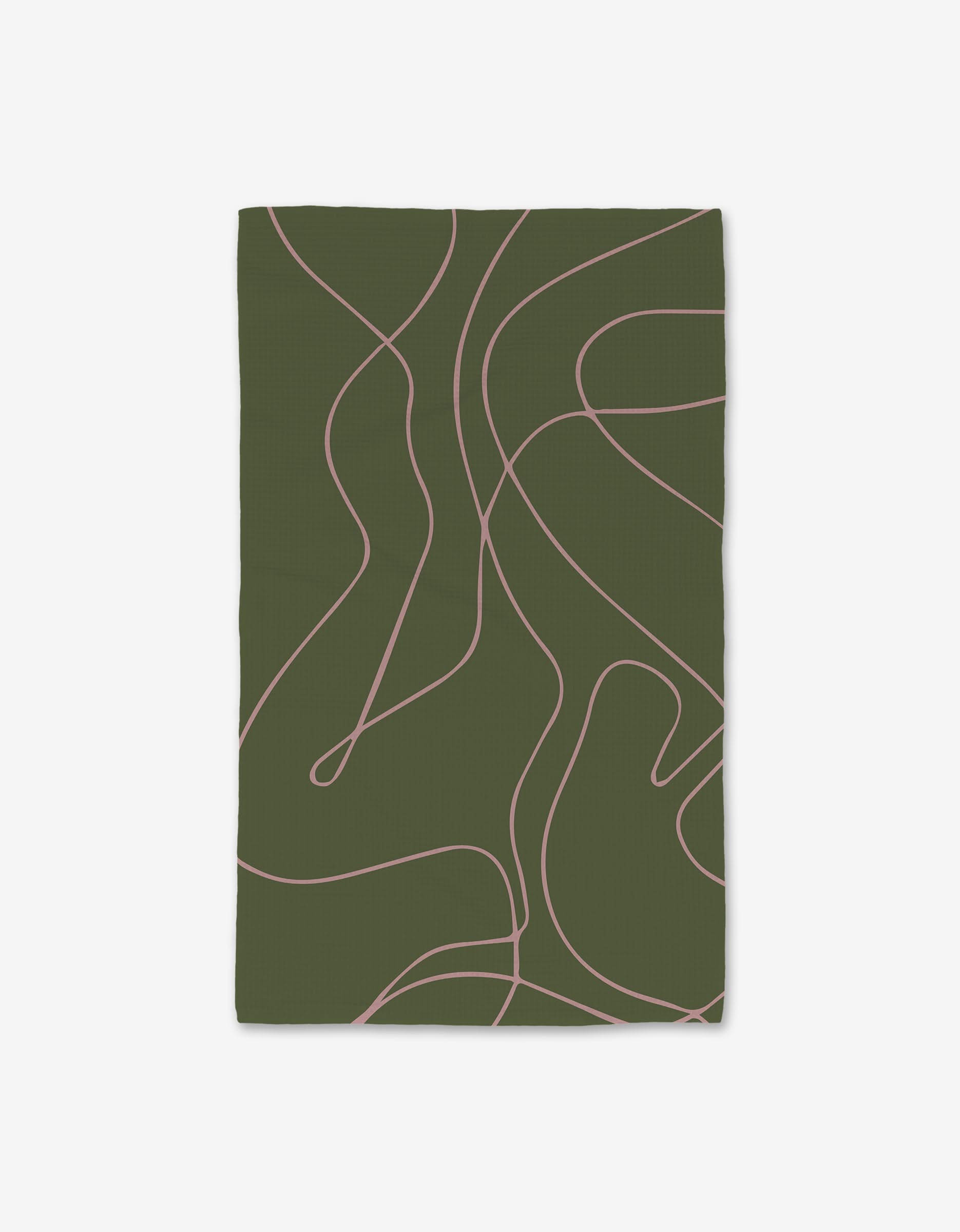 The GEOMETRY Olive Martini blanket features a dark olive green background with light pink abstract wavy lines and a modern, minimalist design, crafted with ultra-absorbent Geoweave technology for superior comfort and style.