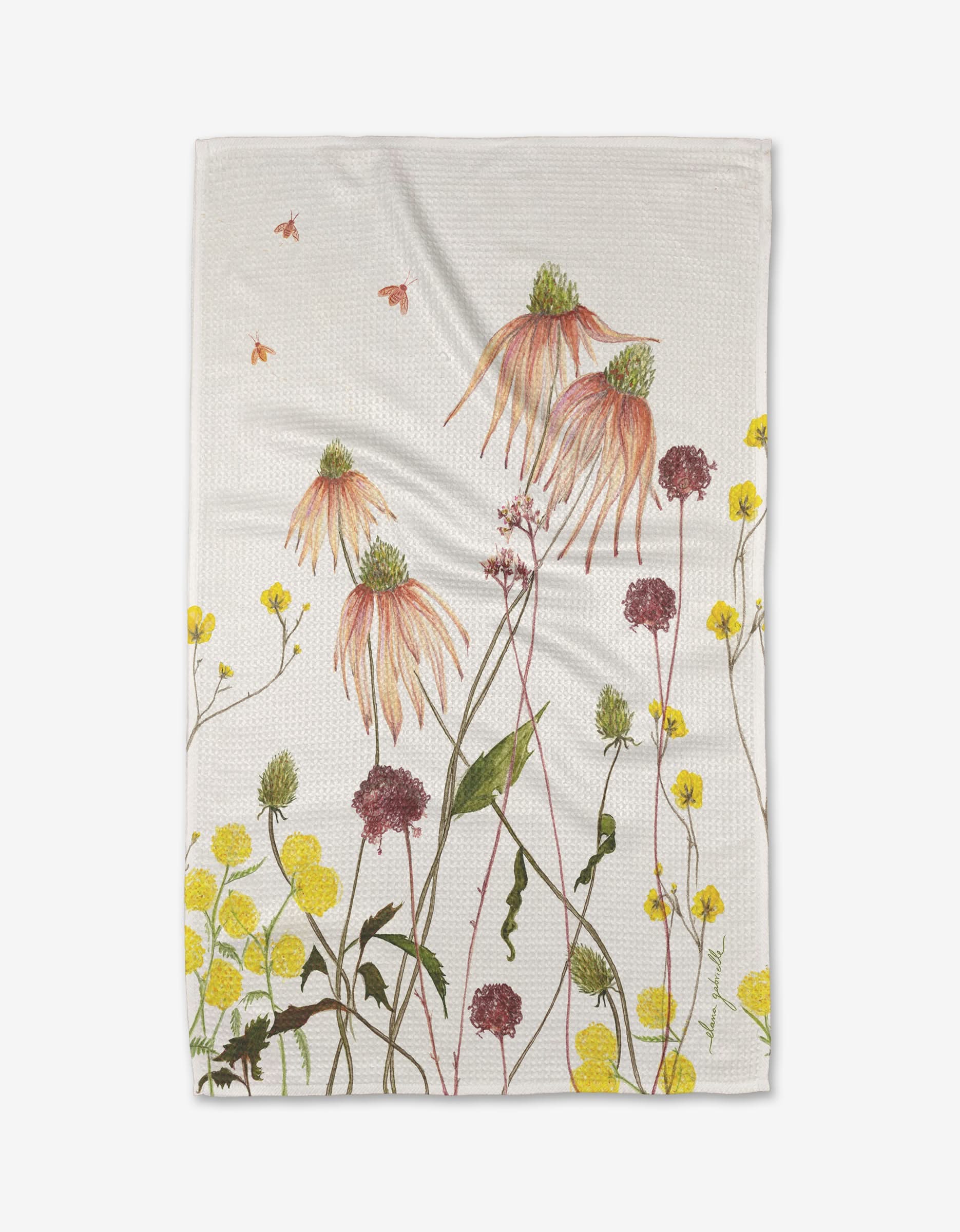 The Elana Gabrielle Garden Flowers tea towel is crafted from soft Geoweave fabric and features illustrated yellow, purple, and pink wildflowers with green stems and orange bees.