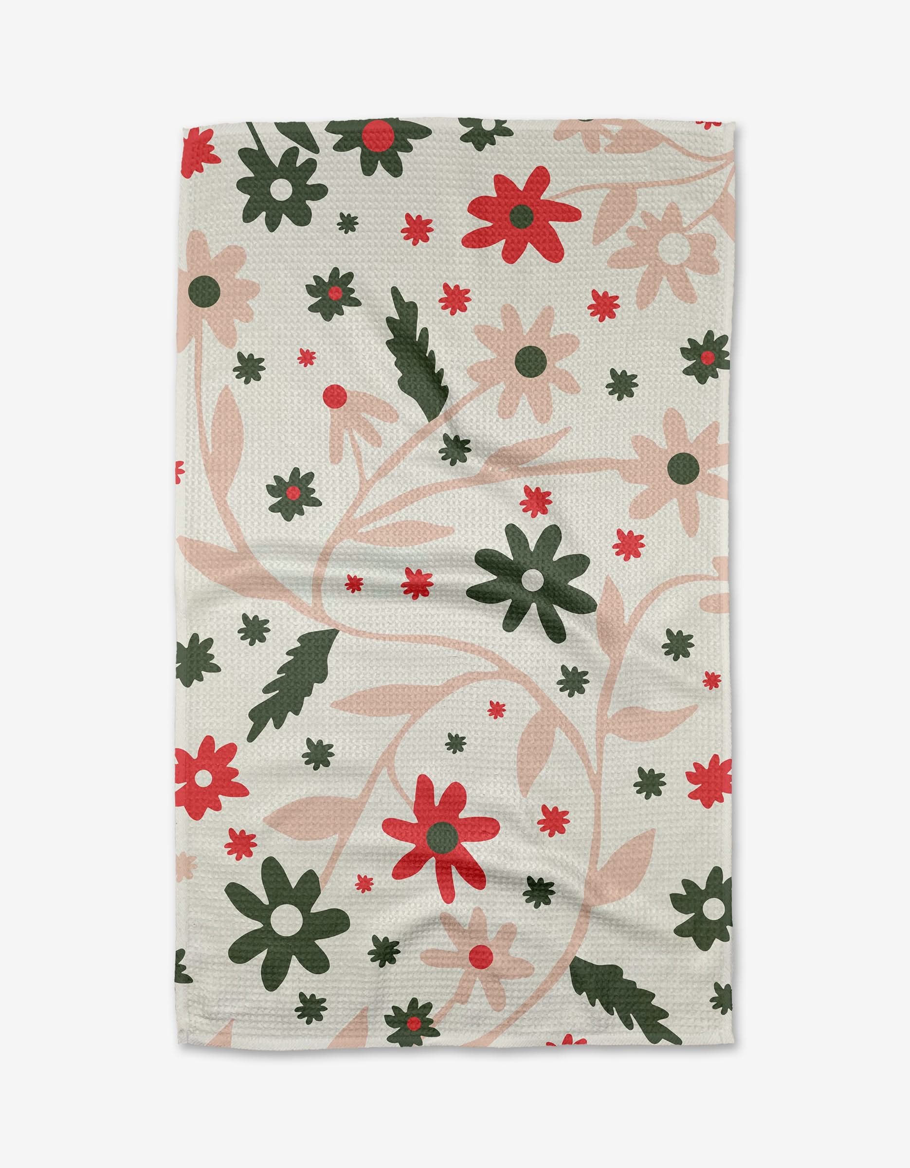 The Ash Cascade Merry Garden tea towel showcases a rectangular shape with red, green, and peach floral patterns scattered on ultra-absorbent white fabric.