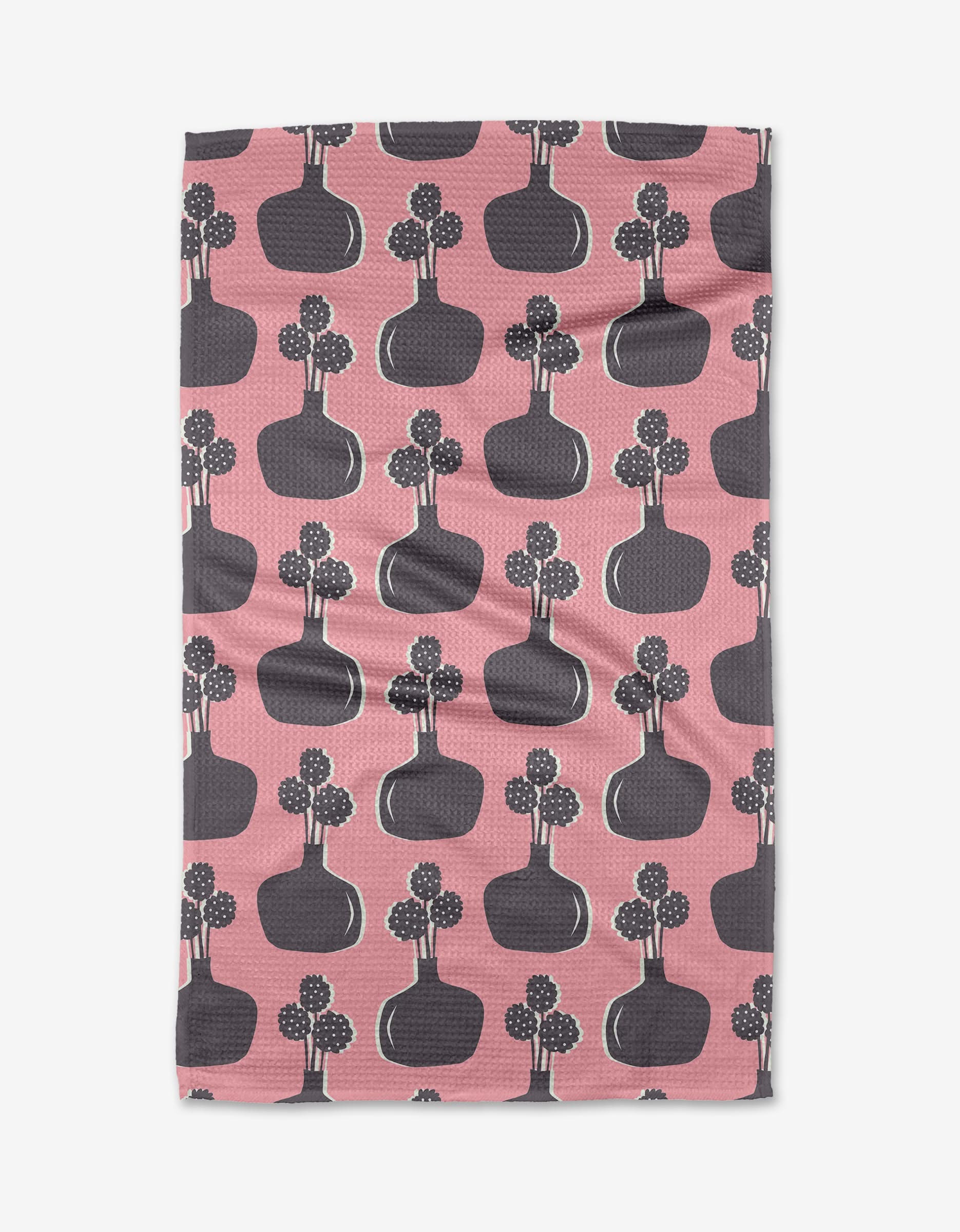 Modern Bouquet by Lizzie Clark is a pink cloth with dark gray vases and stylized dotted flowers, crafted from ultra-absorbent Geoweave fabric for a playful, modern touch.