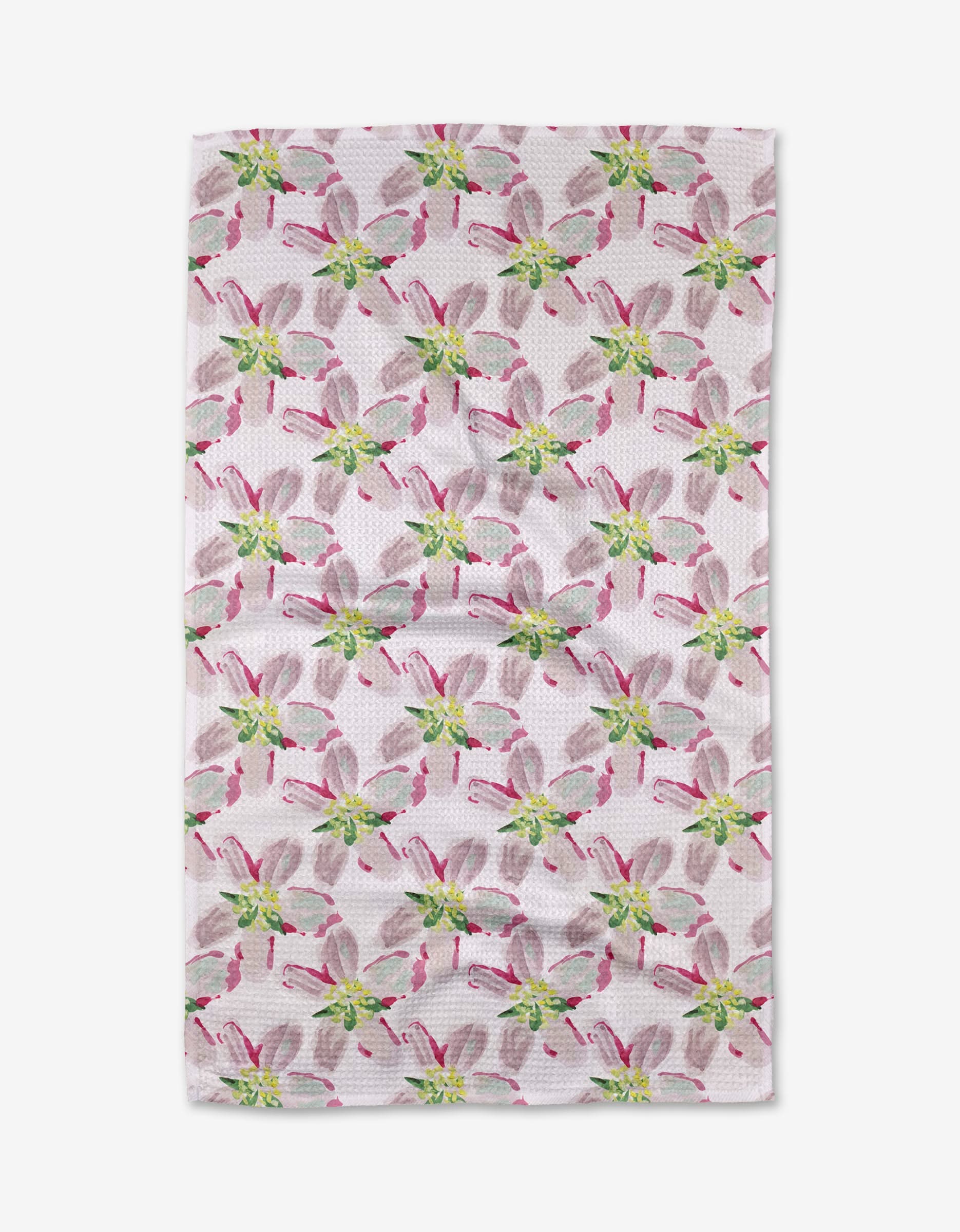 The Orchard in Bloom tea towel from Ania Zwara Art features a white textured surface with evenly spaced stylized floral designs in pink, green, and gray. Made from ultra-absorbent recycled materials for eco-friendly use.