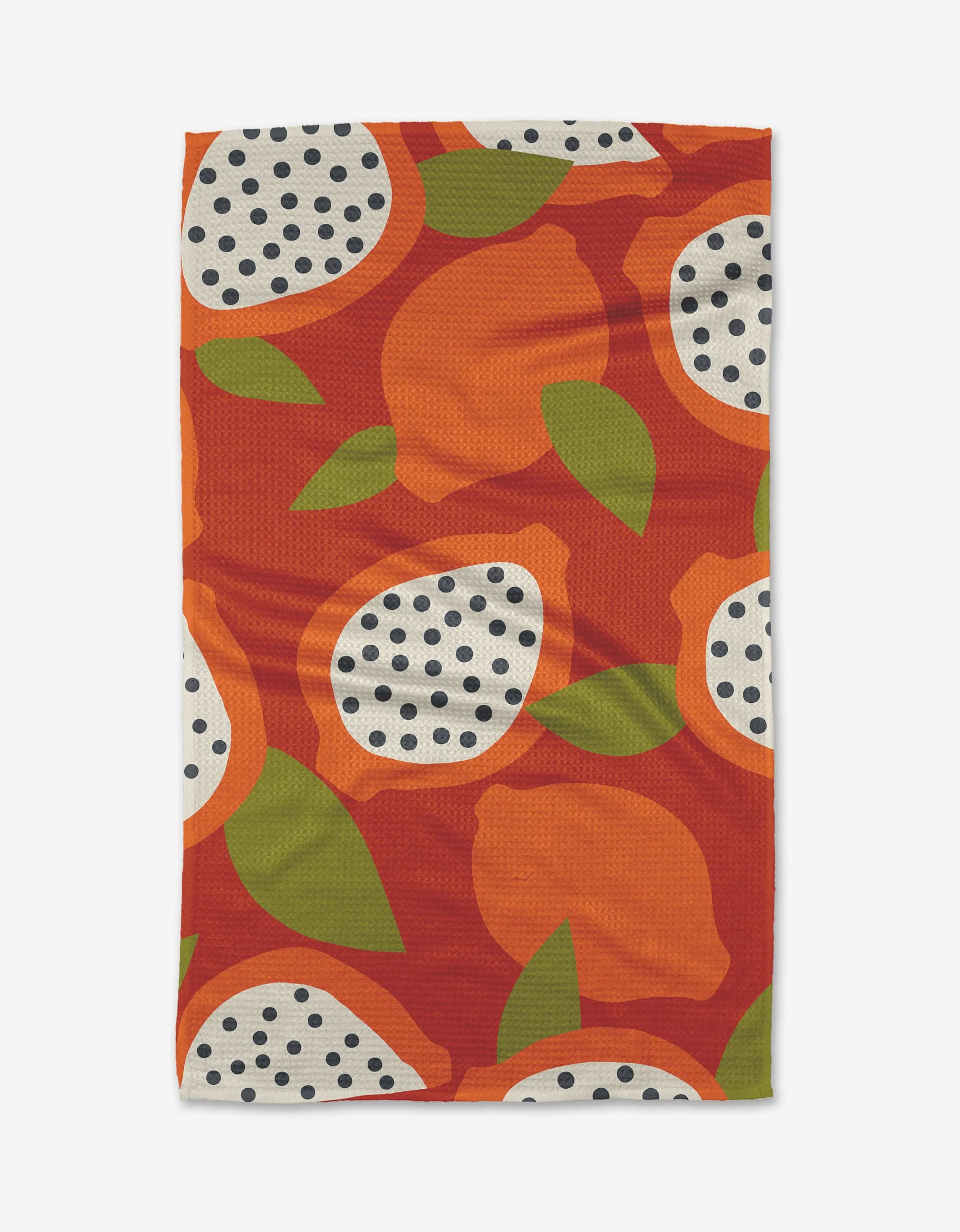 The Papaya Playtime tea towel by Lizzie Clark features an orange background with abstract whole and halved lemons and leaves, crafted from recycled materials.