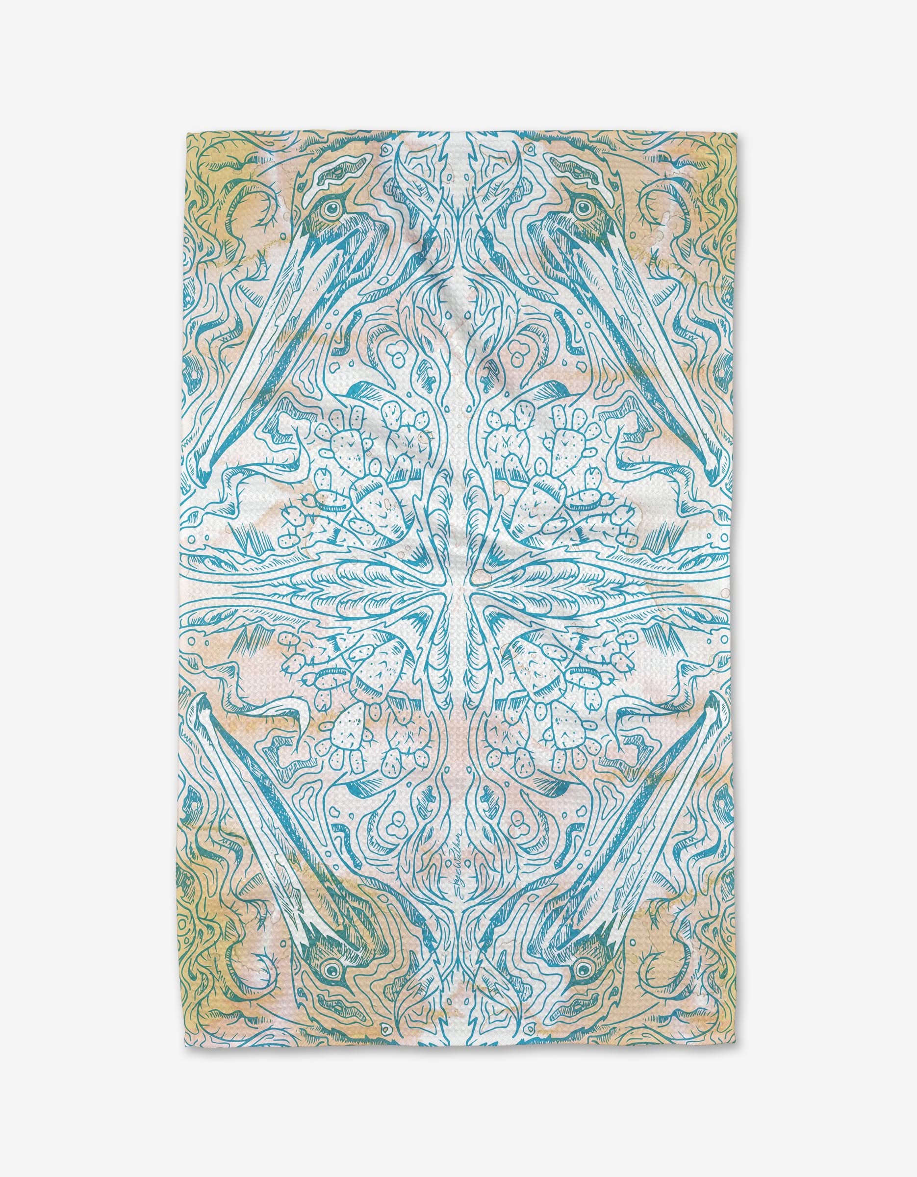 The Pelican by Skye Walker is a rectangular textile made from ultra-absorbent Geoweave fabric, displaying a symmetrical abstract design in turquoise, white, and tan with mirrored leaf and wave-inspired patterns.